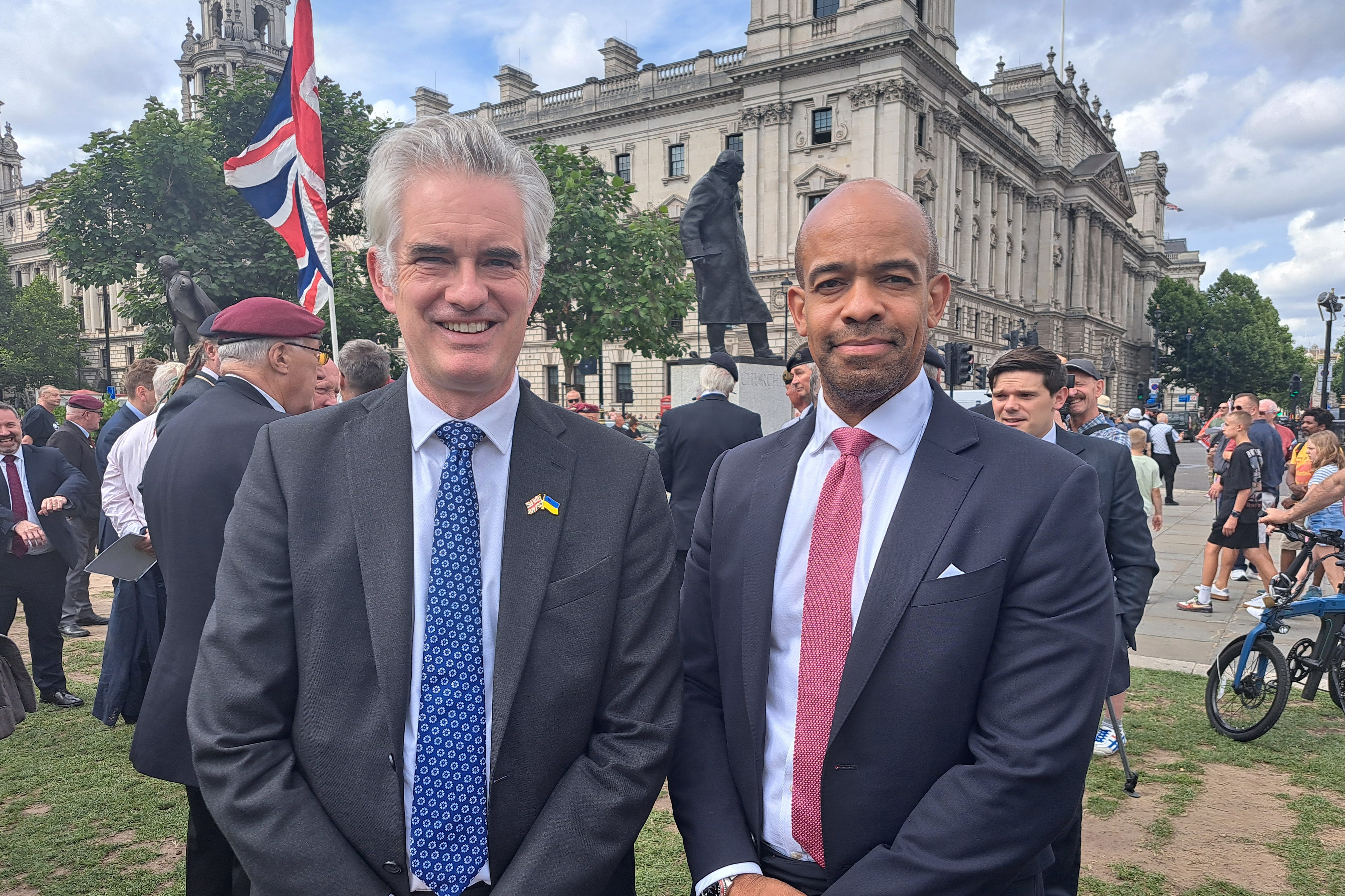 Shadow Defence Secretary James Cartlidge and Ben Obese-Jecty join a march outside Parliament to protest against the possible repeal of the Legacy Act (Lily Shanagher/PA)