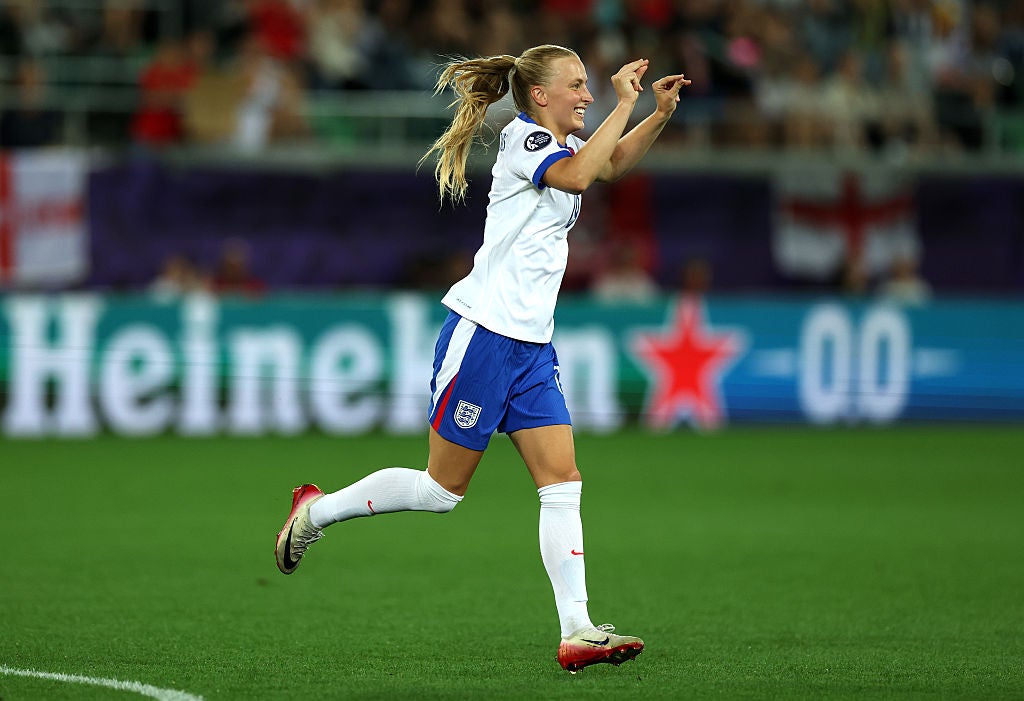 Beever-Jones snaps her fingers as she runs to the bench