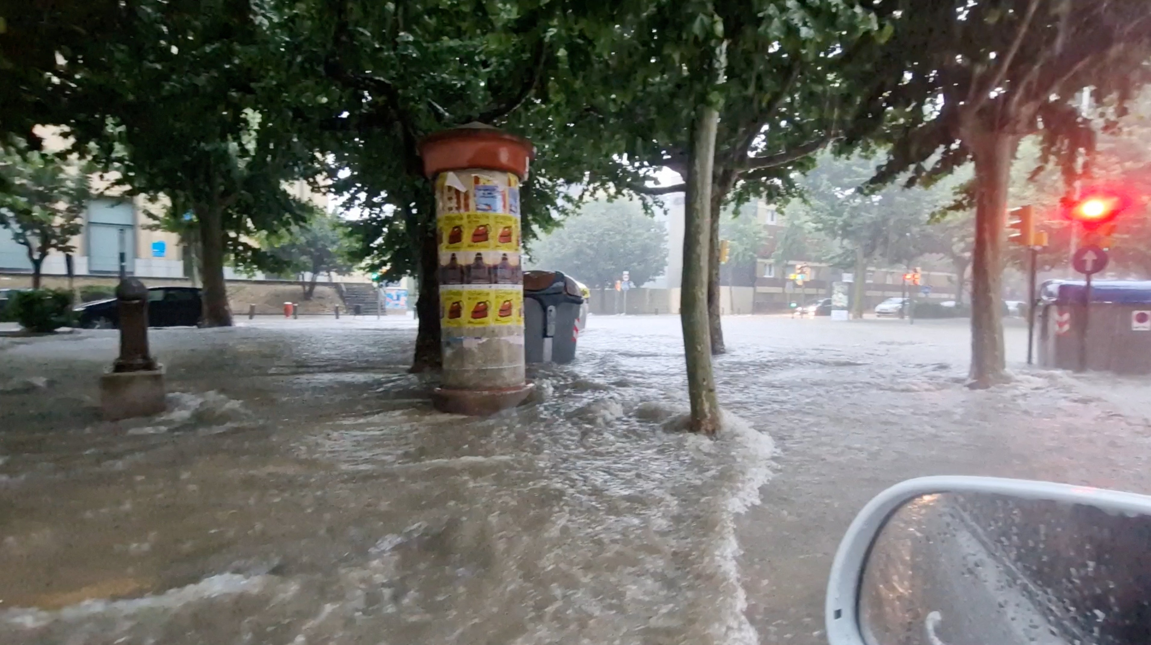 Flood water flows as it rains in Igualada, Spain on 12 July