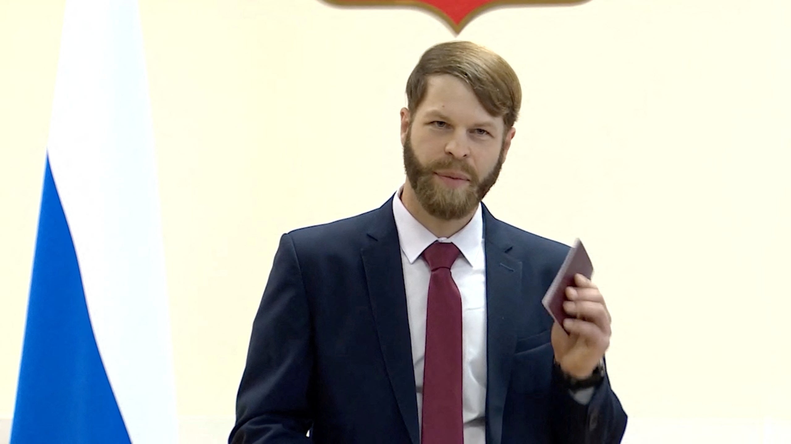 Martindale speaks after receiving a Russian passport in Moscow