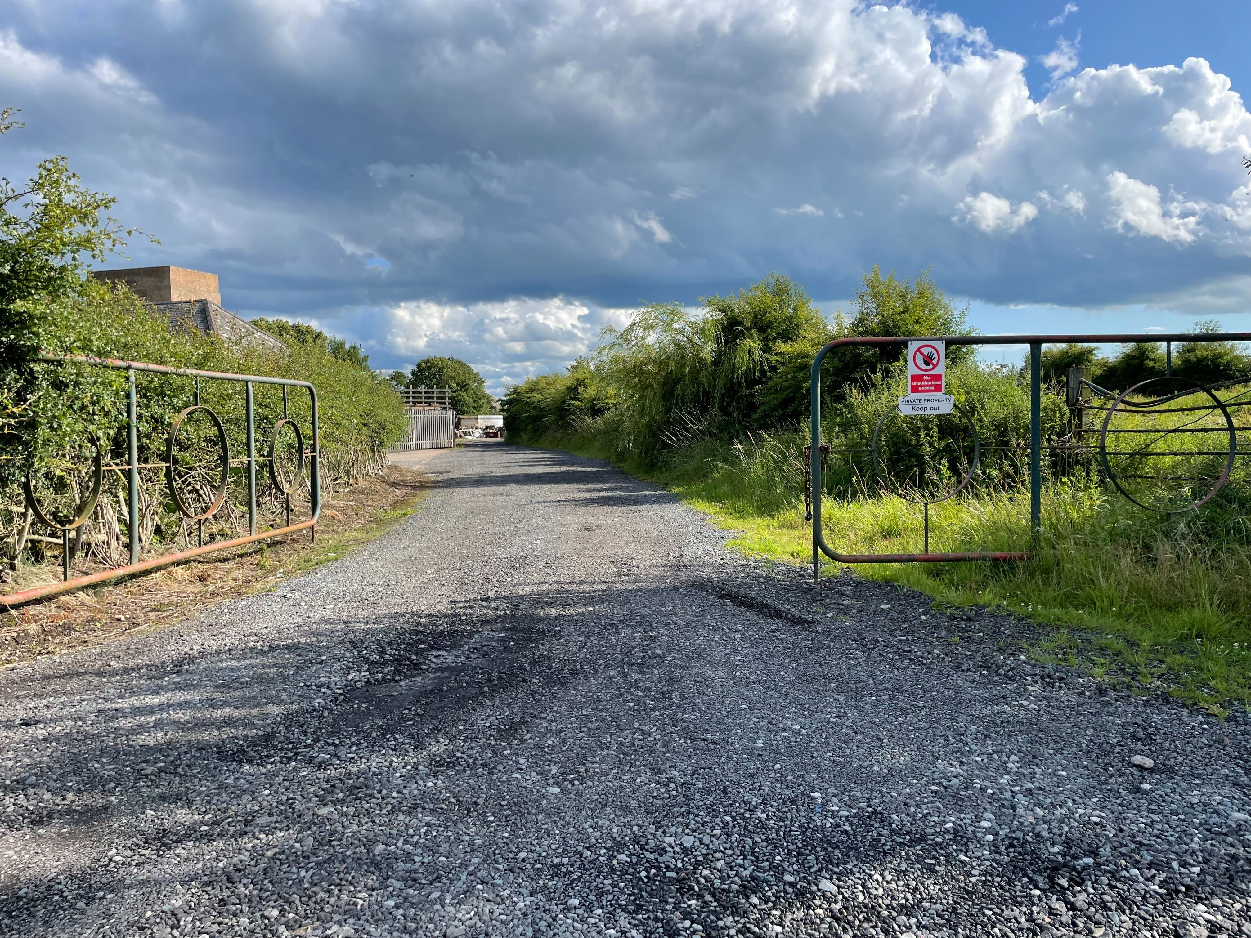 The gated entrance to the Old Fuel Depot in Kirkbride where Adam Carruthers lived with his partner and children