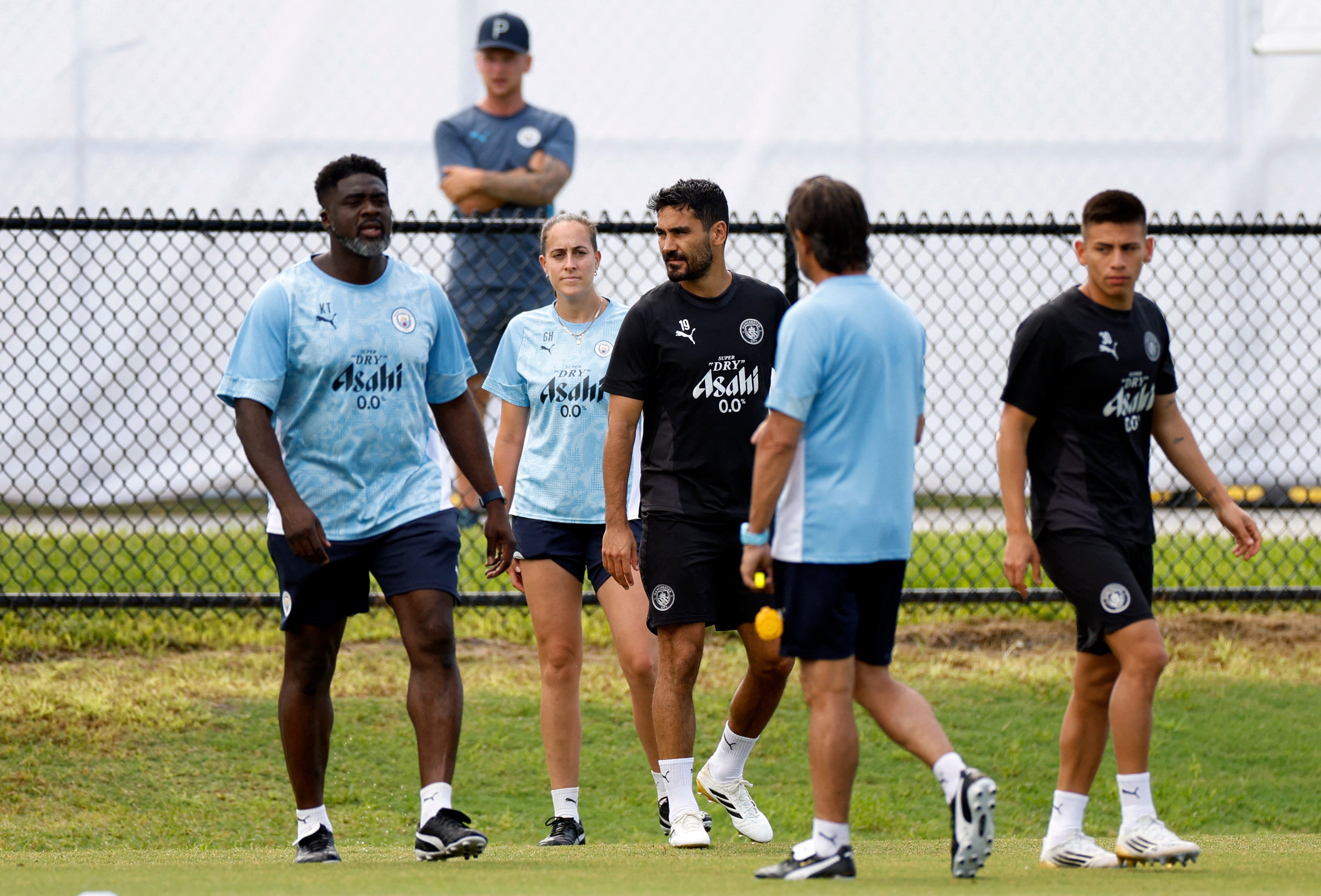 Kolo Toure (left) worked with Man City senior side during the Club World Cup