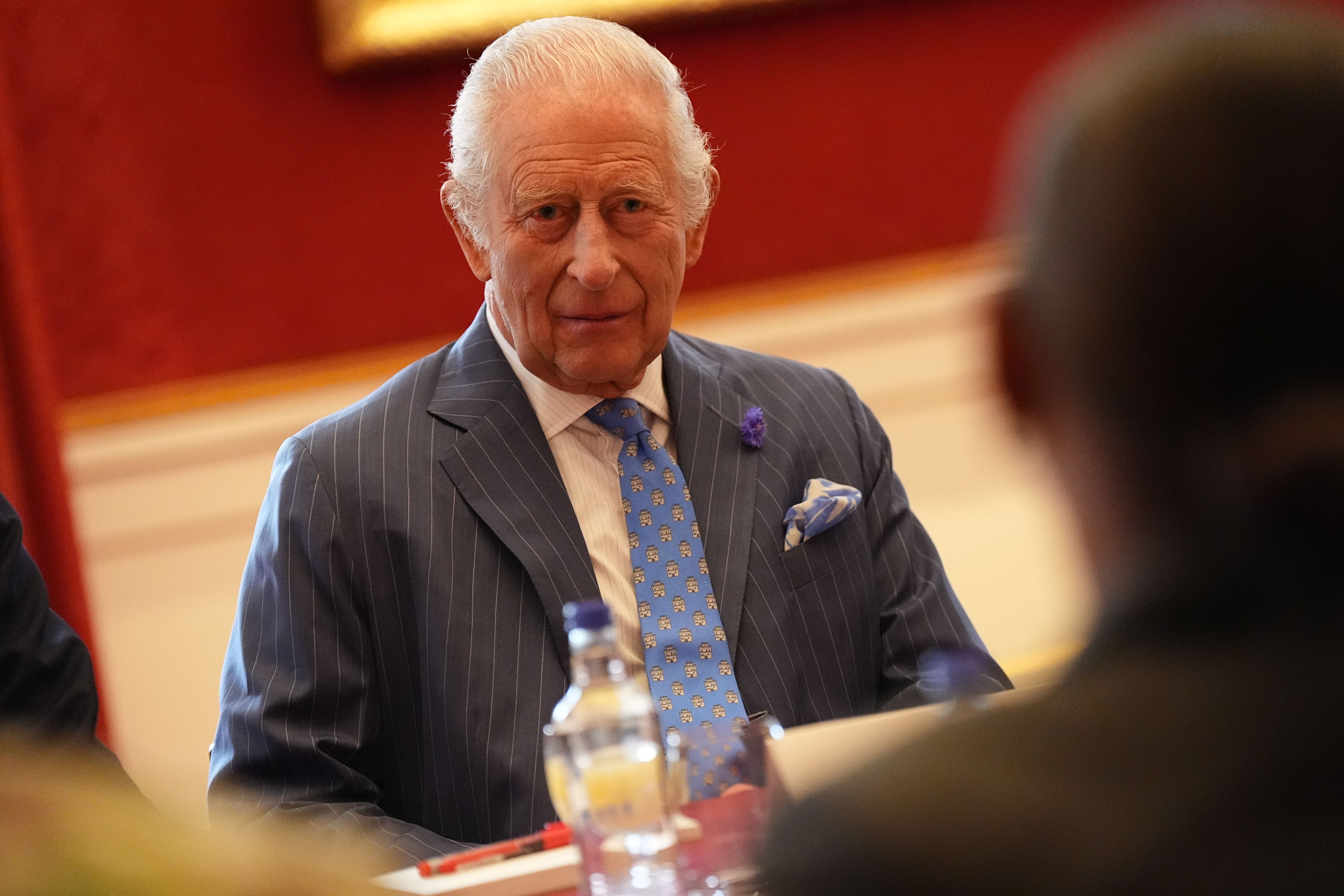 Charles listens during the summit at St James’s Palace in London (Aaron Chown/PA)