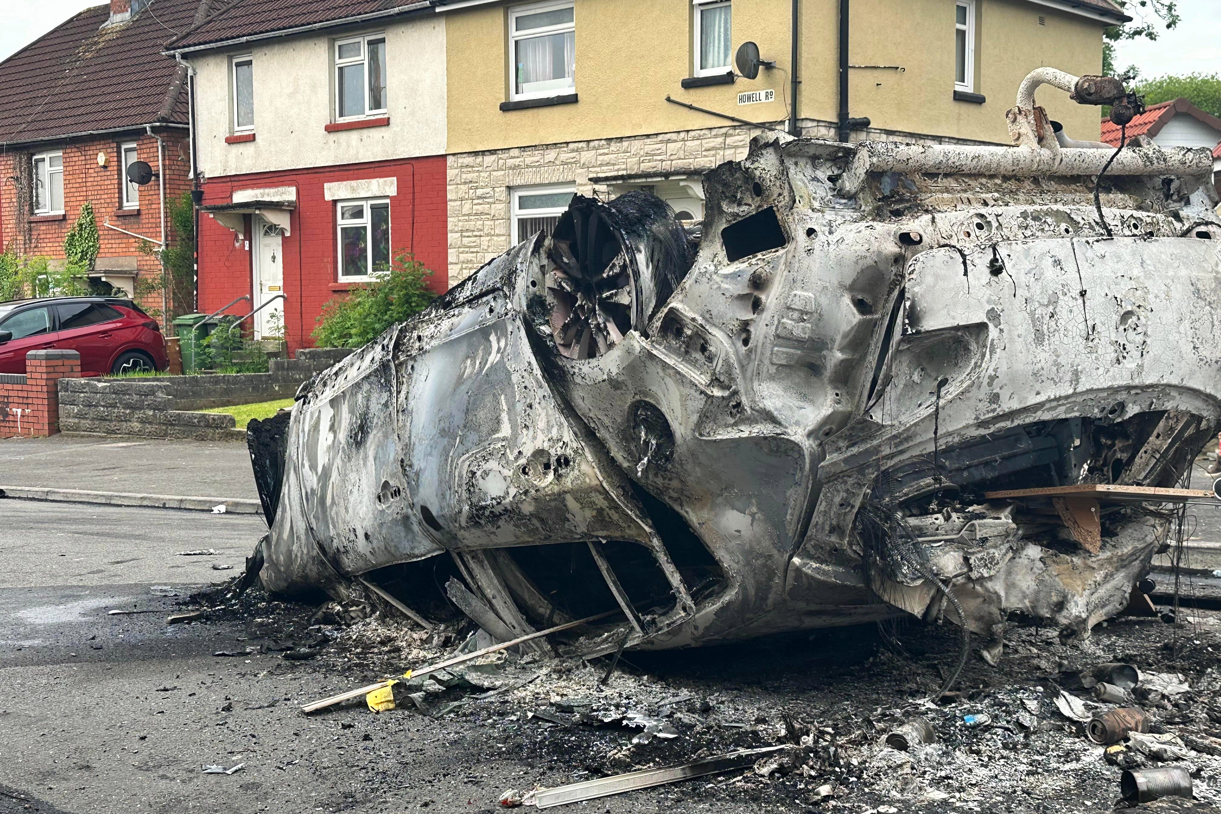 Three men have pleaded guilty to rioting in Cardiff following the deaths of two boys in 2023 (PA)