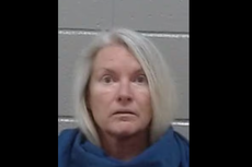 Woman claimed her ex-husband was fishing with his new girlfriend. Cops say she killed him and hid him under rugs in their carport