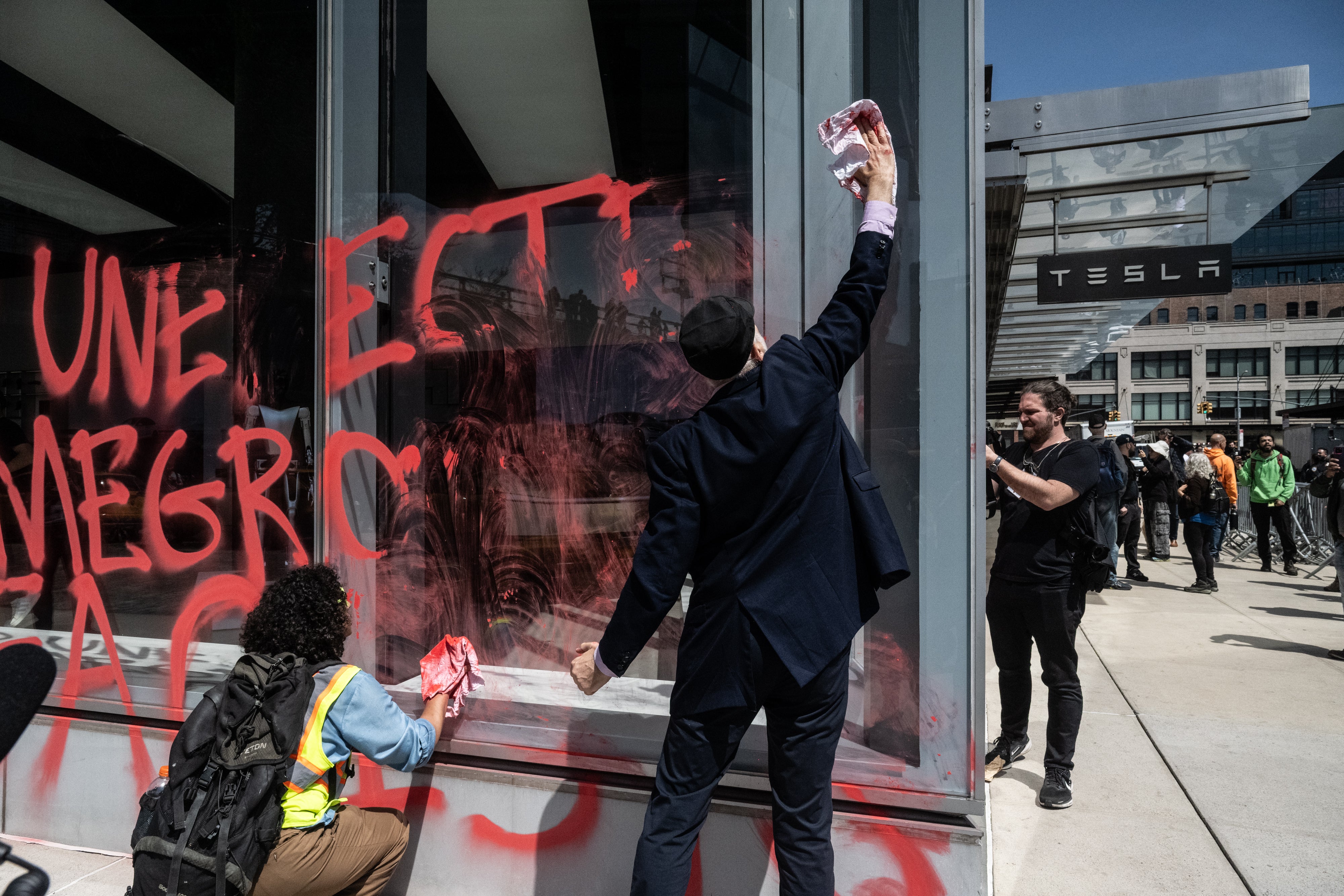 There have been protests at Tesla dealerships and even some cases of attacks on property at car showrooms and lots, charging stations and privately owned Tesla cars