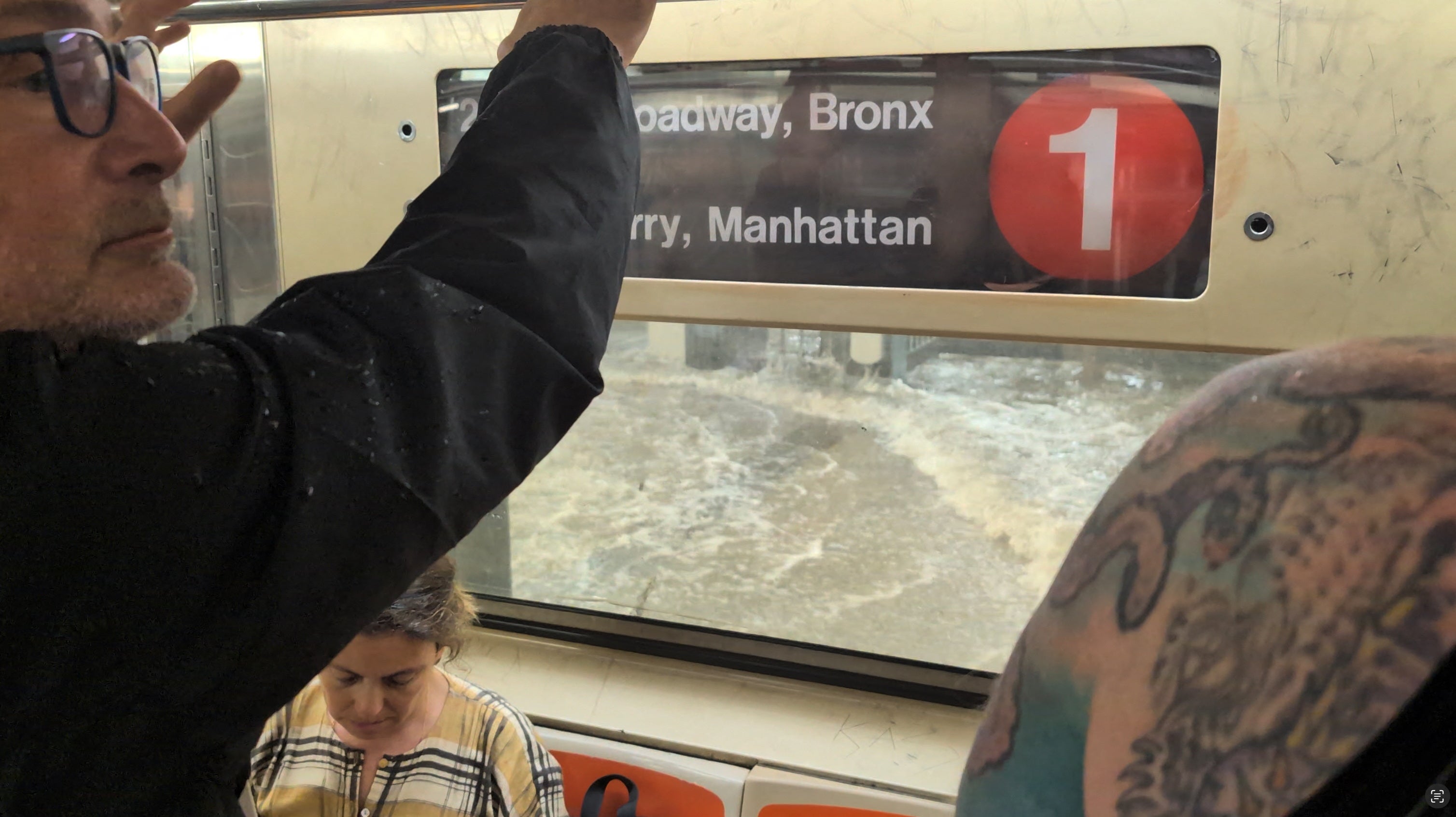 Meanwhile, on Monday night a flood warning was in effect for all five boroughs of the Big Apple, while video shared online from commuters showed subway stations filling up with water and sloshing into carriages