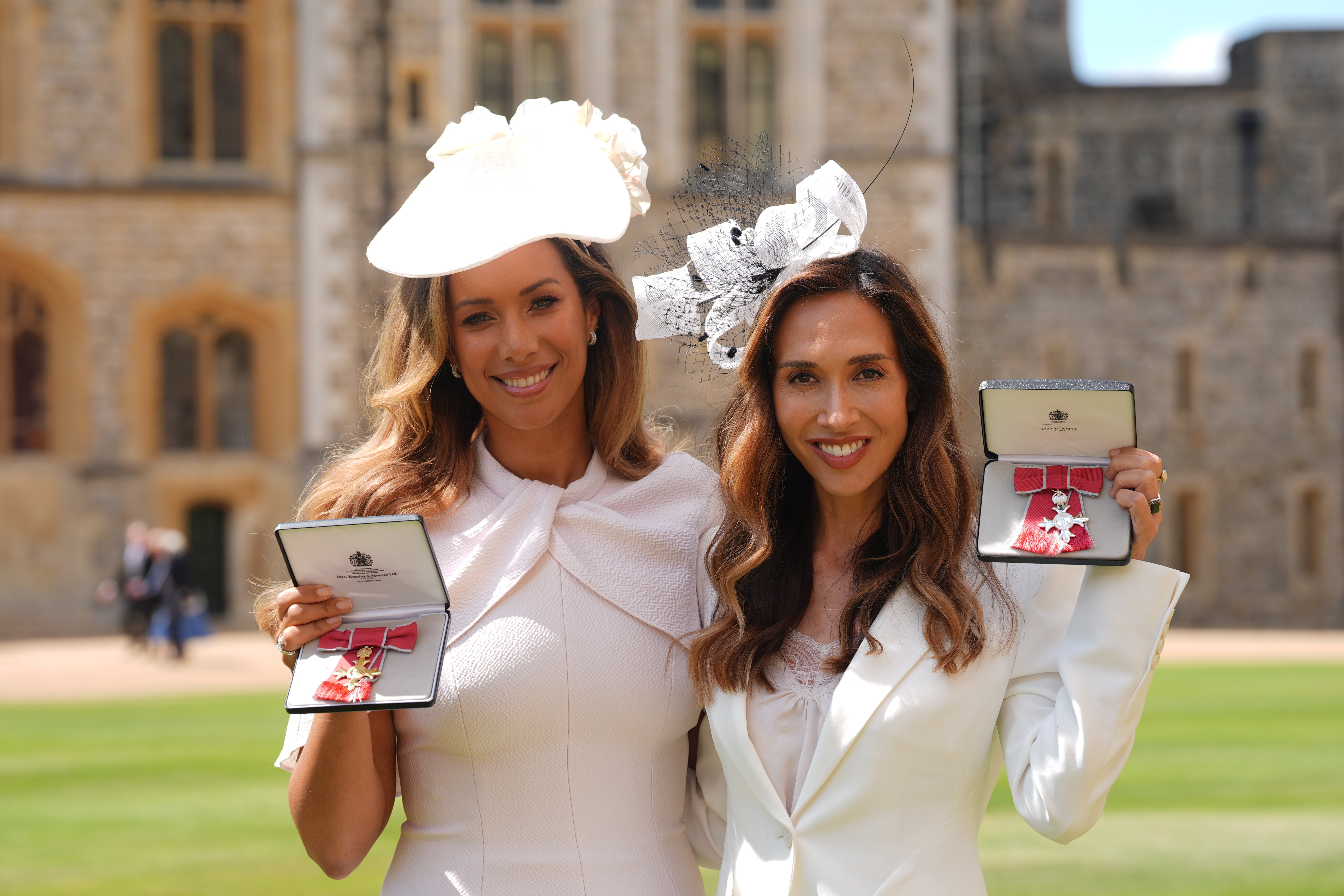 Leona Lewis with Myleene Klass after they received their medals during an Investiture ceremony at Windsor Castle (Yui Mok/PA)