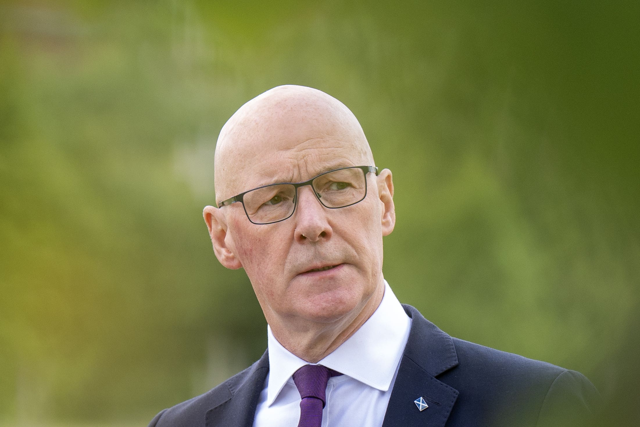 John Swinney will meet President Donald Trump later this month (Jane Barlow/PA)