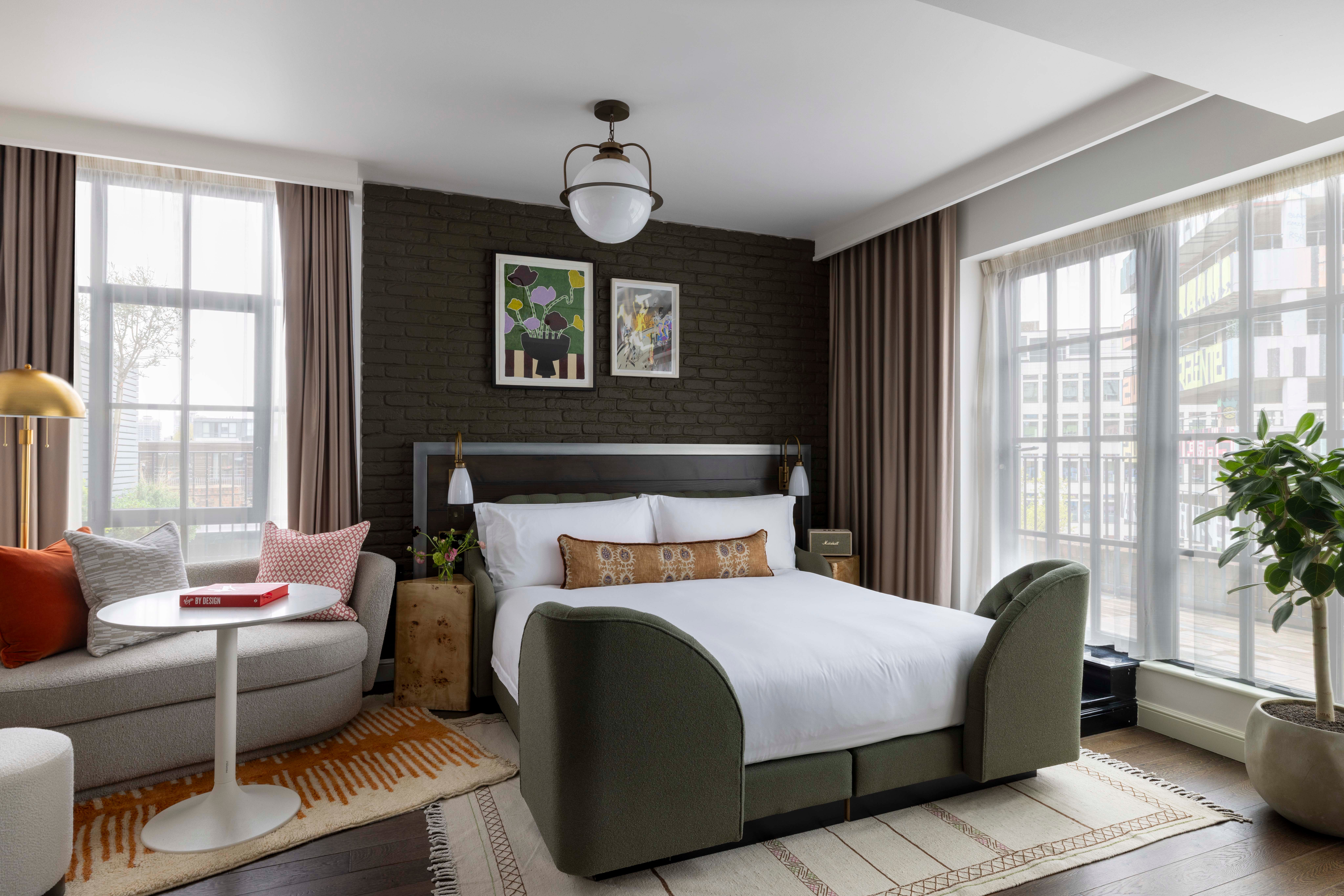 The rooms at this hotel prioritise a ‘live-in bed’ attitude, knowing guests will likely spend most of the time in or on the bed, so have made it as comfy as possible