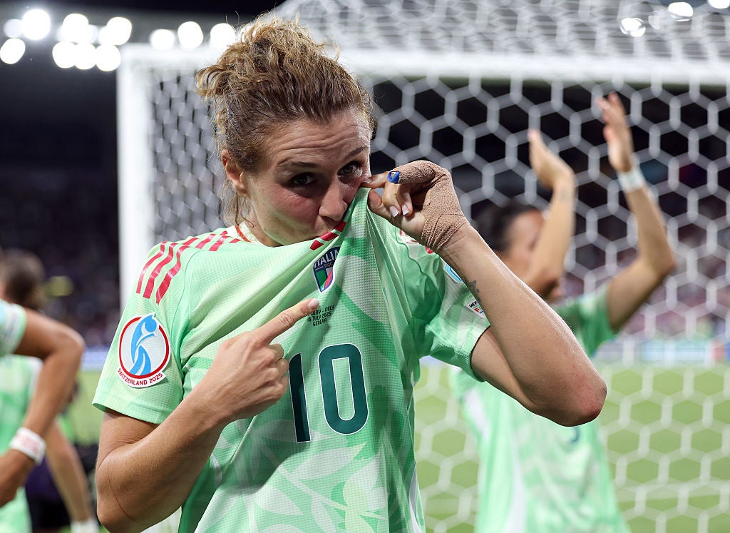 Cristiana Girelli celebrates after scoring a historic double to send Italy through