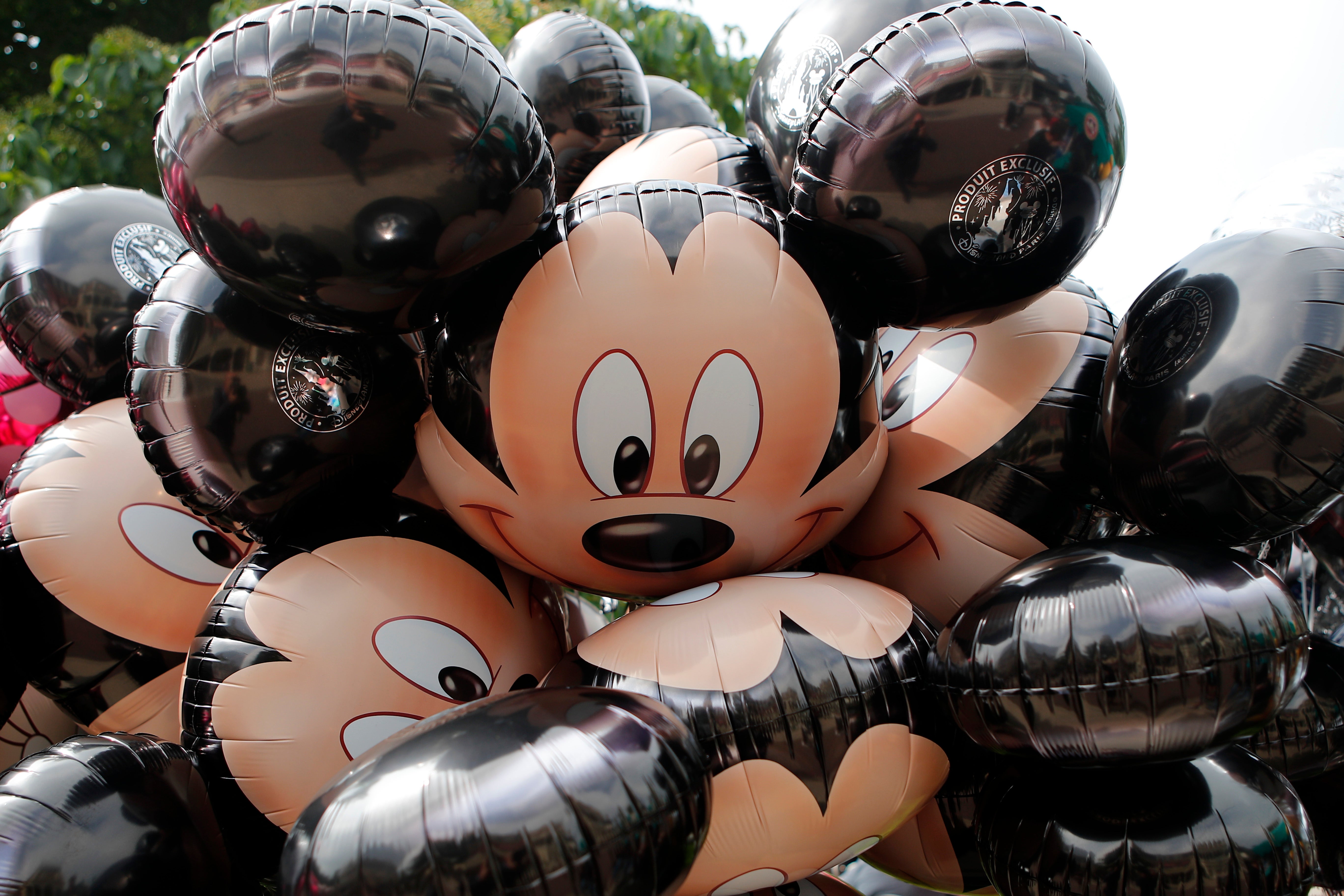 Mickey Mouse balloons are displayed at Disneyland Paris in Chessy, France, June 8, 2018. (AP Photo/Francois Mori, File) Mickey Jewelry Lawsuit