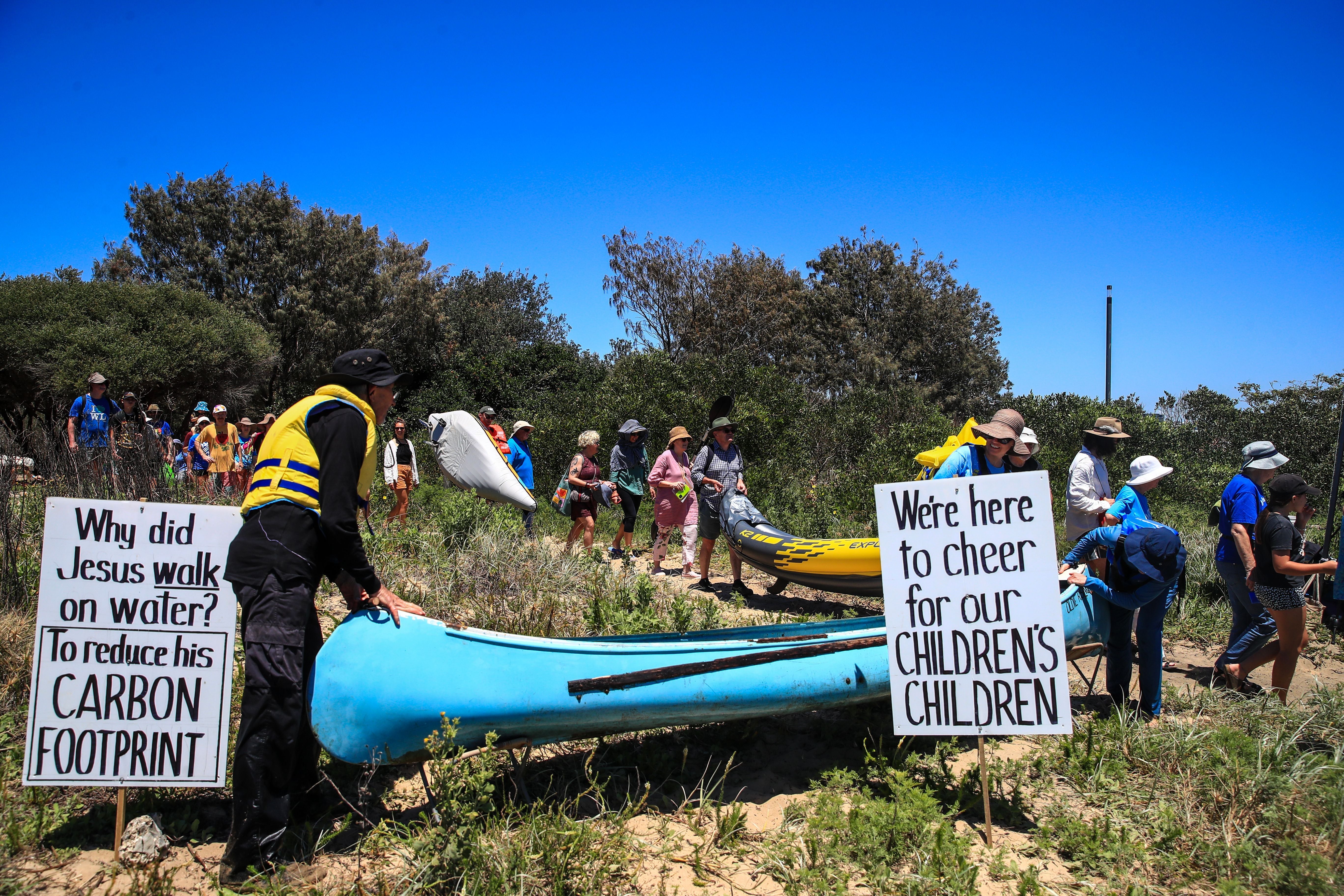 File: Climate activists from the group Rising Tide staged a protest in Newcastle Harbour in Australia attempting to block the entry of a large bulk carrier into the world's largest coal port