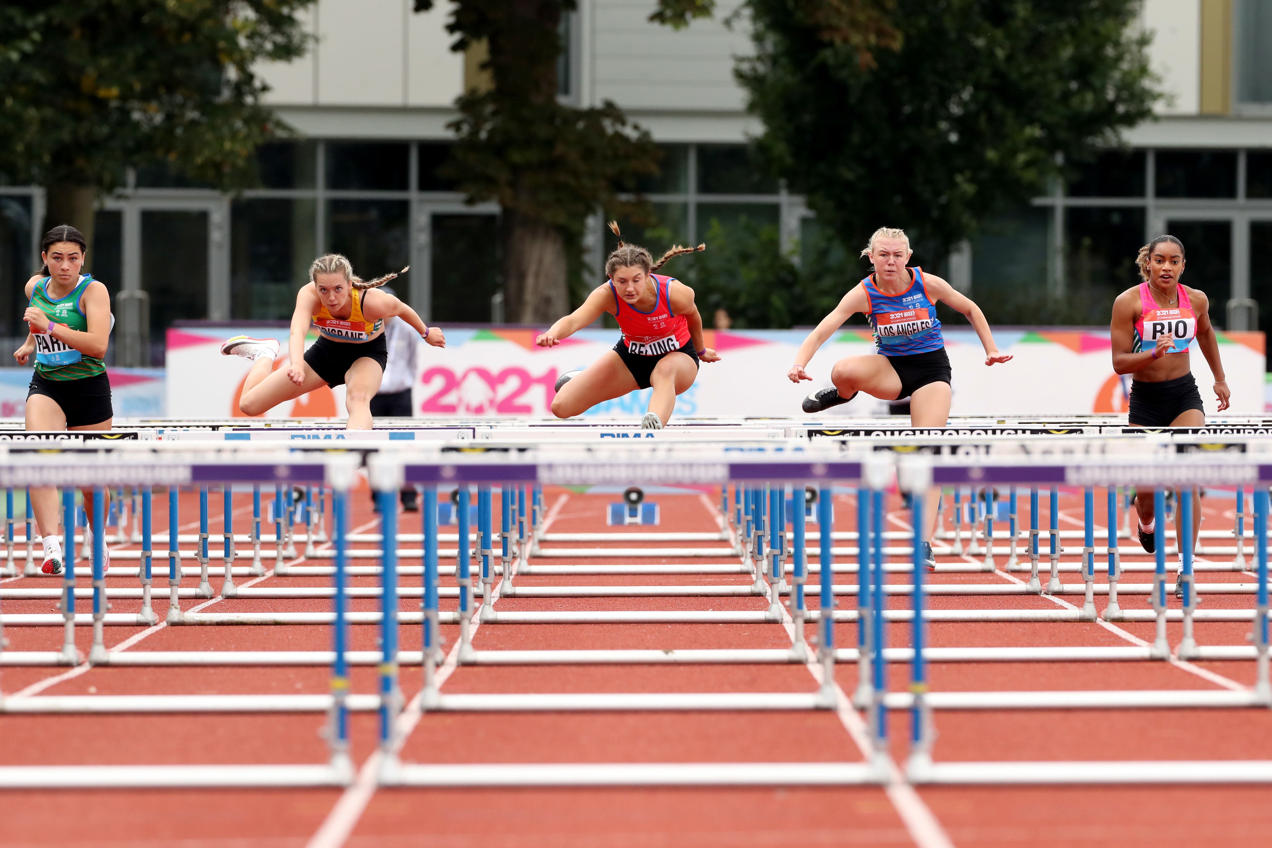 Athletes participating in the girls 80 metre hurdles of the 2021 School Games (Bradley Collyer/PA)