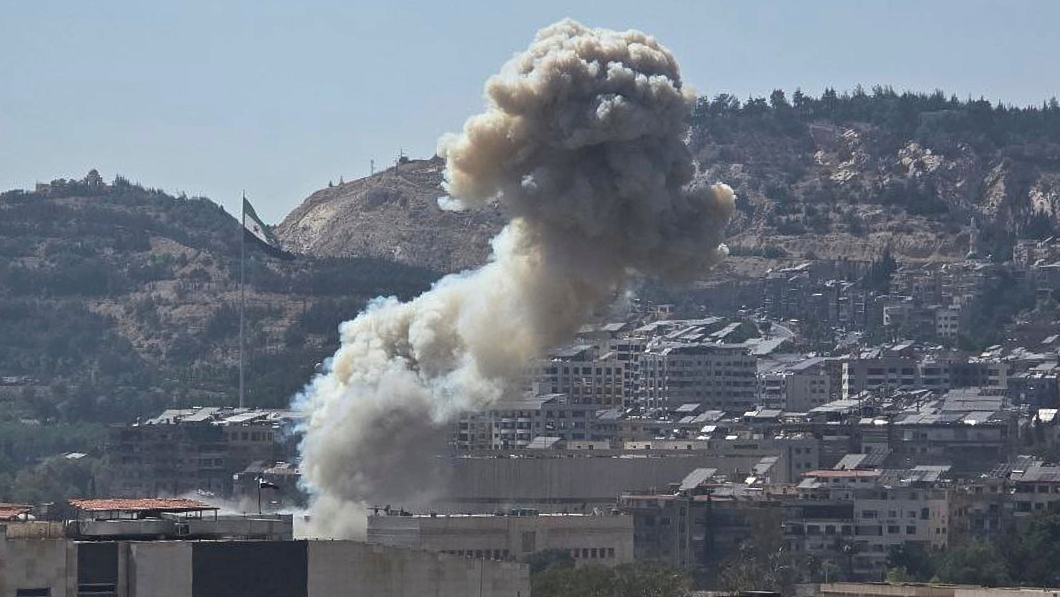 Smoke rises from an Israeli airstrike that hit the Syrian Defence Ministry in Damascus