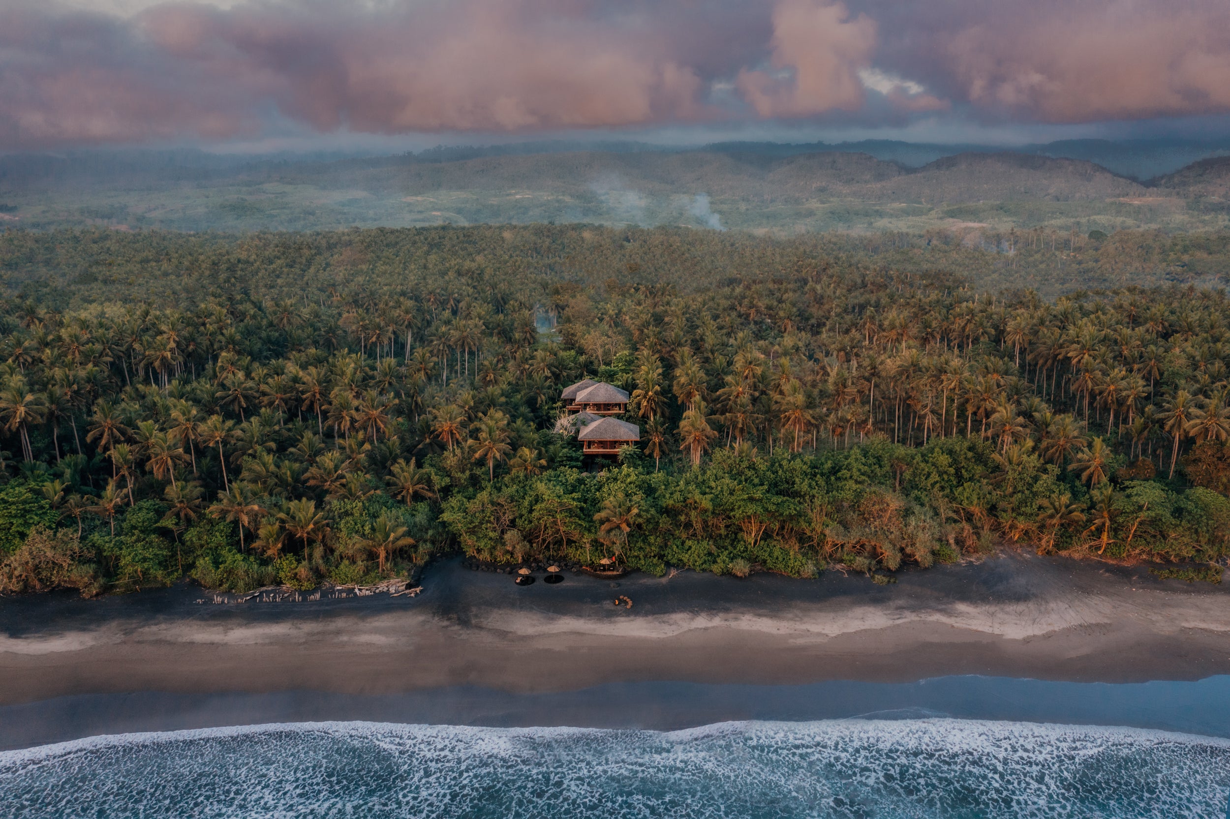 Lost Lindenberg can be found near a deserted volcanic sand beach in West Bali
