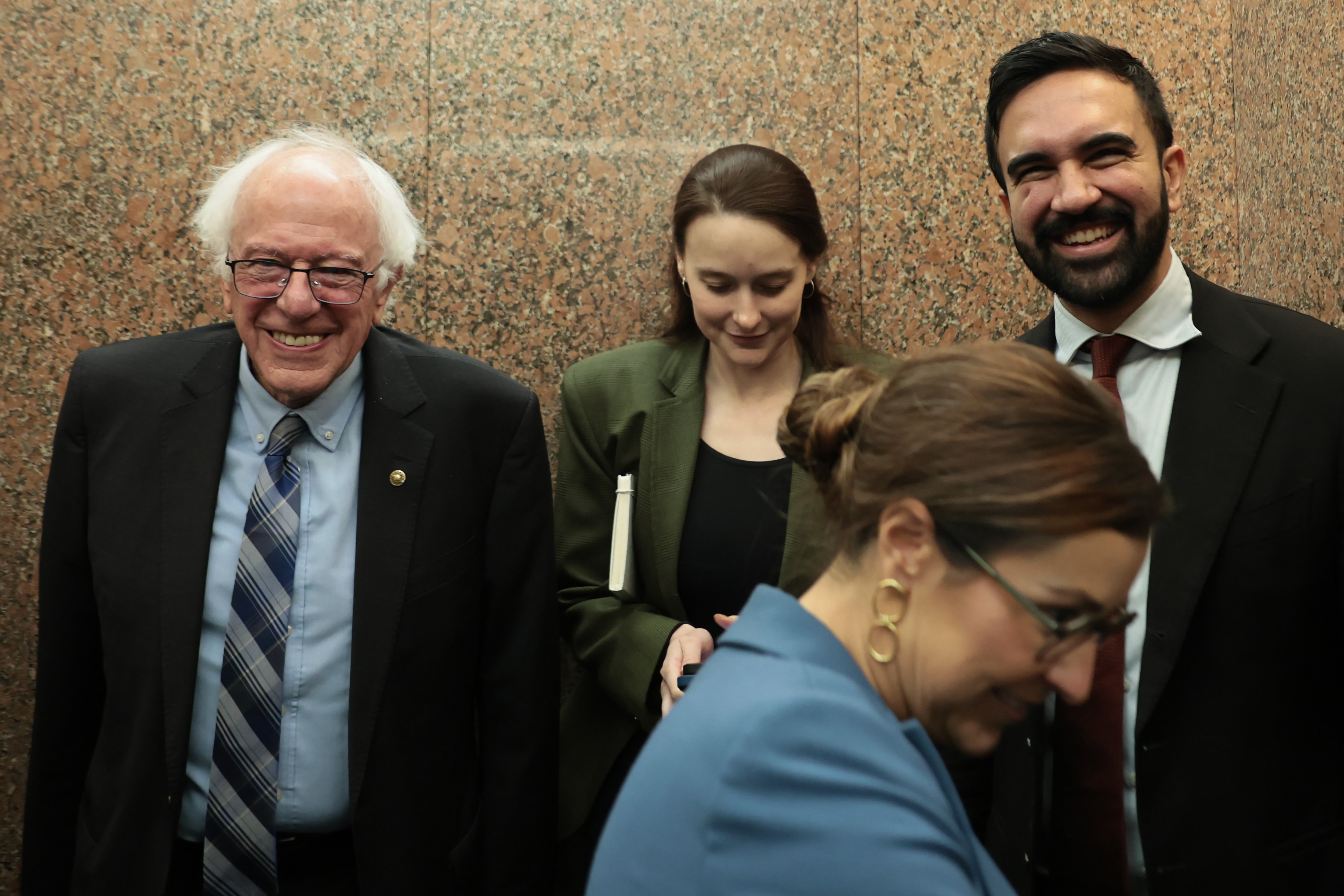 Sen. Bernie Sanders (I-VT) and NYC Mayoral Candidate Zohran Mamdani enter an elevator after a meeting in the Dirksen Senate Office Building on July 16, 2025 in Washington, DC.