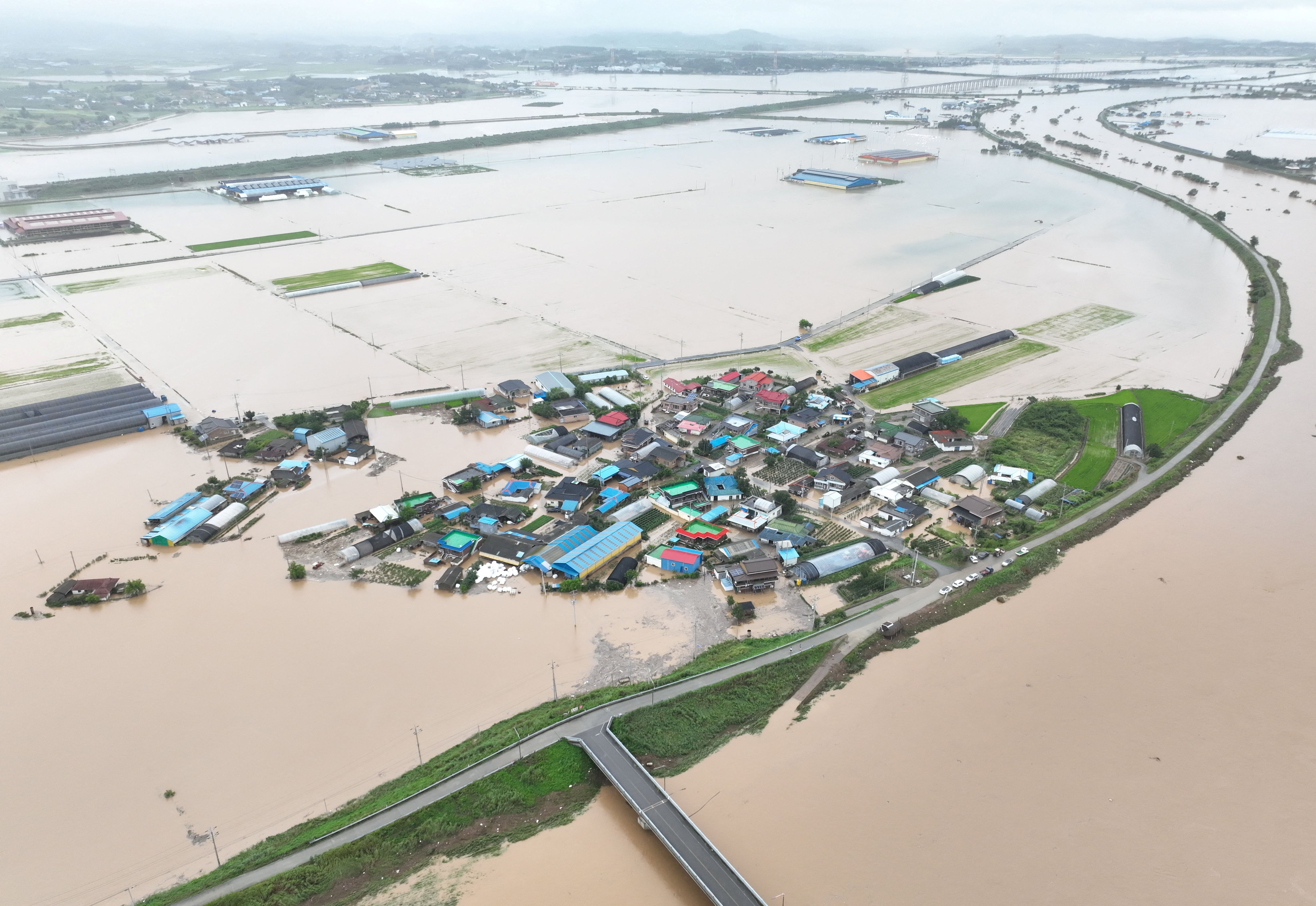 ‘Car is being swept away’: Man’s last call to wife as South Korea hit by heavy rain and landslides