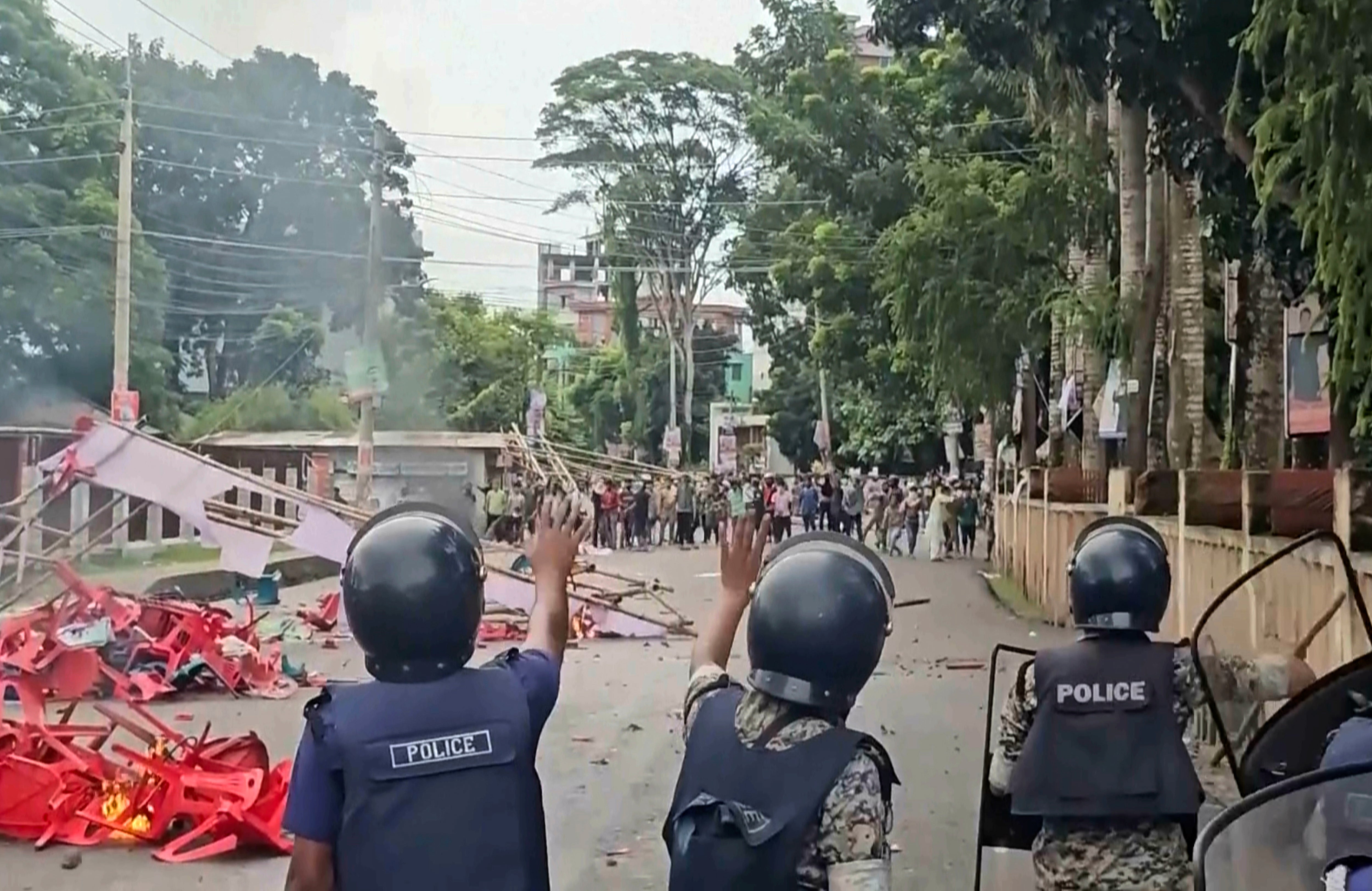 Supporters of the ousted Prime Minister Sheikh Hasina clash with the police