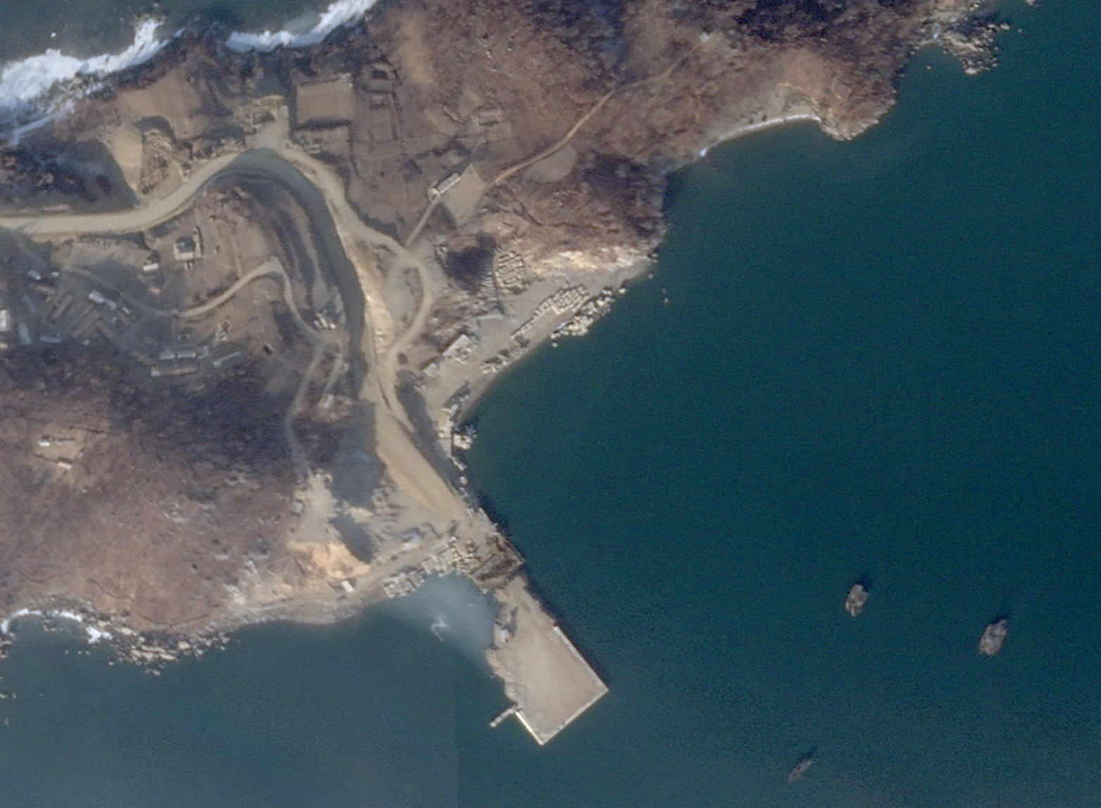 A satellite image shows what appears to be a maritime pier under construction at the Sohae Satellite Launching Station