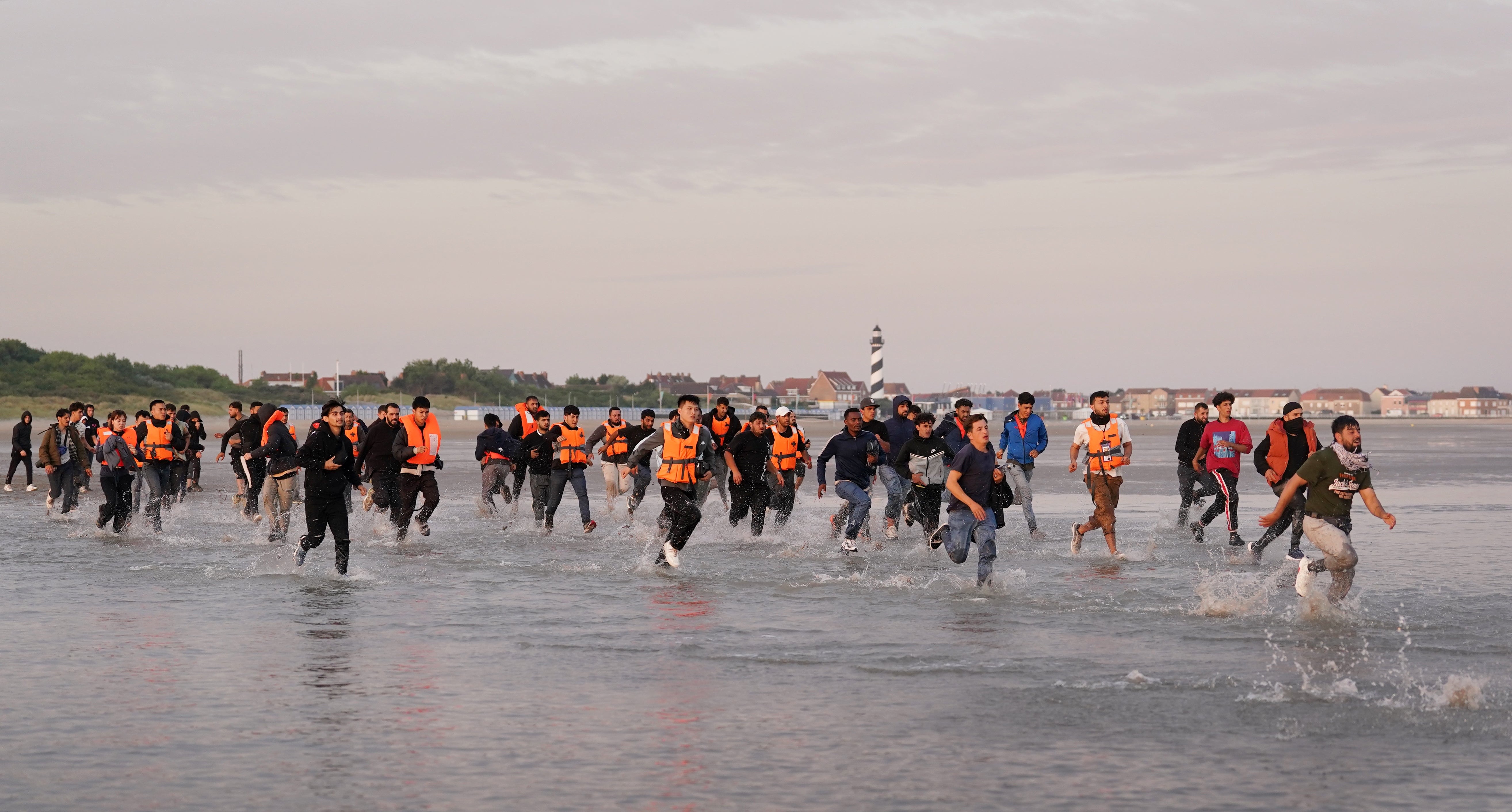 Ministers hope to launch the AI technology for use on migrants arriving in the UK on small boats and lorries in 2026