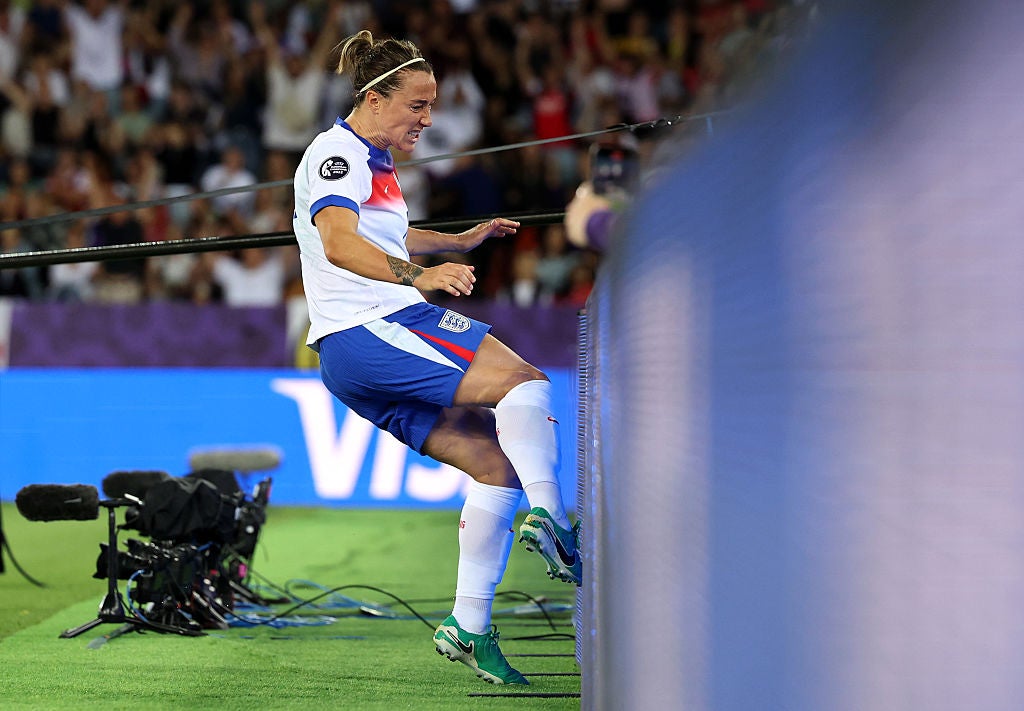 Bronze celebrated getting England back into the game by booting the advertising hoarding