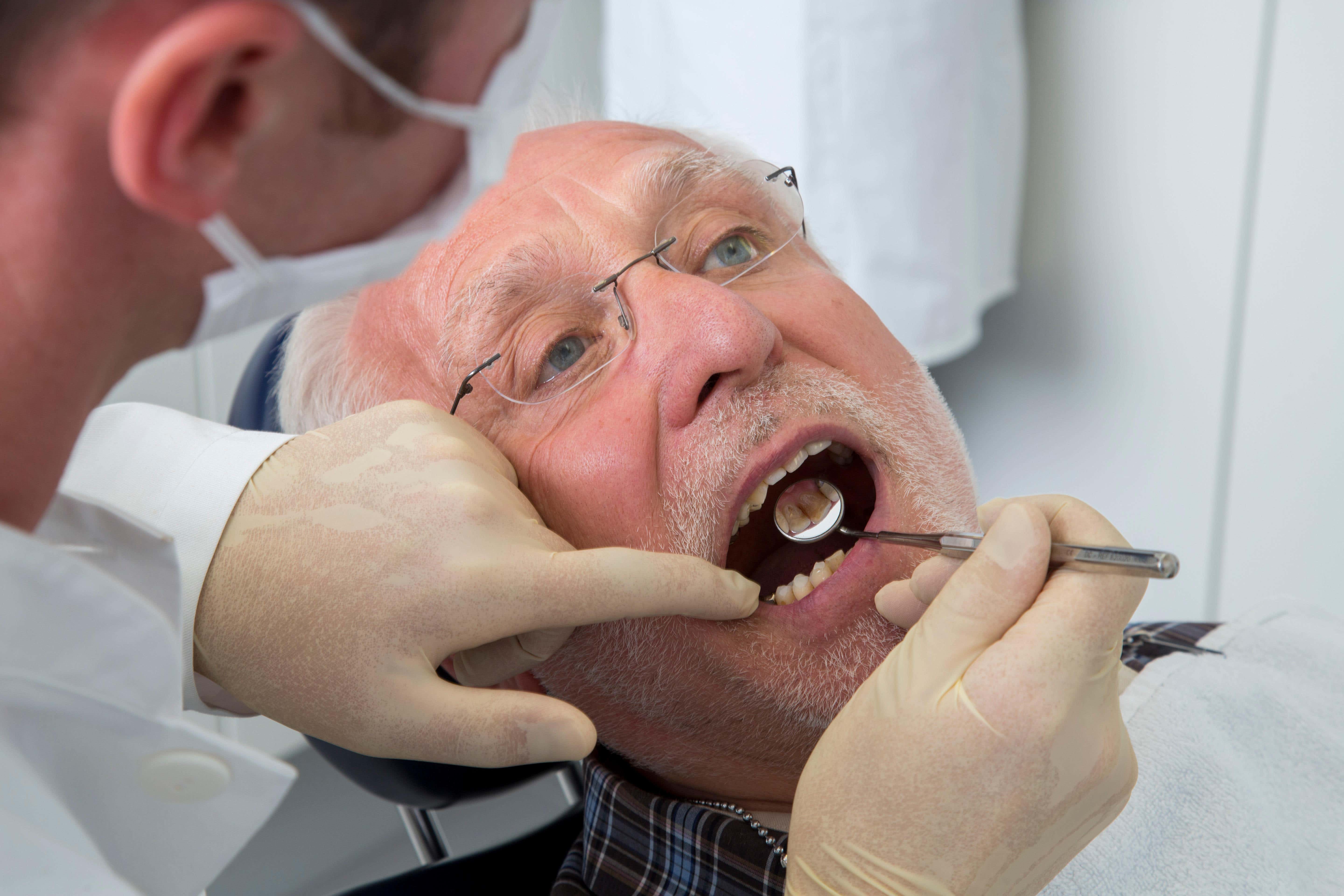 Receding gums and cavities are more prevalent in older adults (Alamy/PA)
