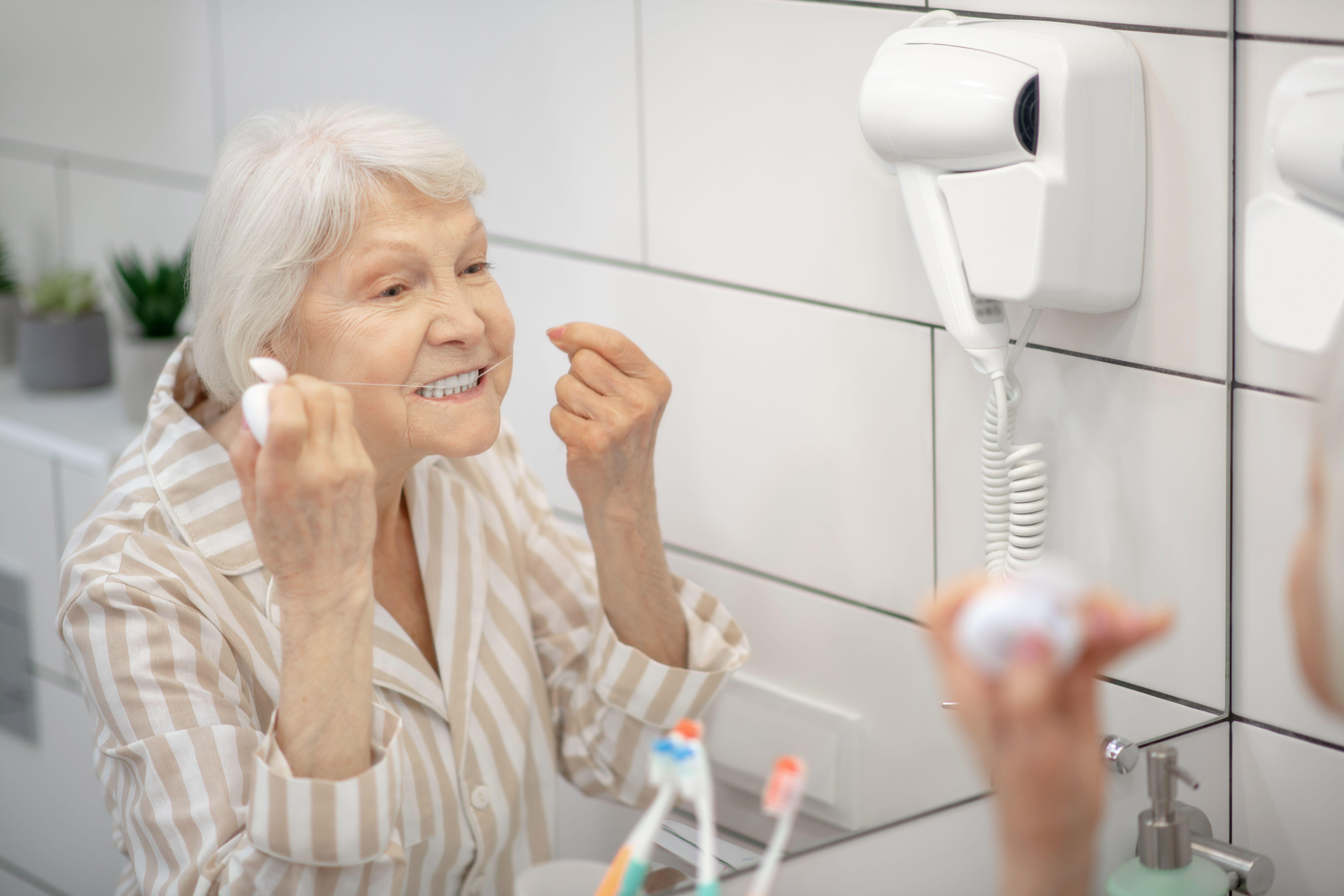 Remember to floss (Alamy/PA)