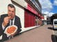 Mystery artwork of former England boss eating chips appears on town centre wall
