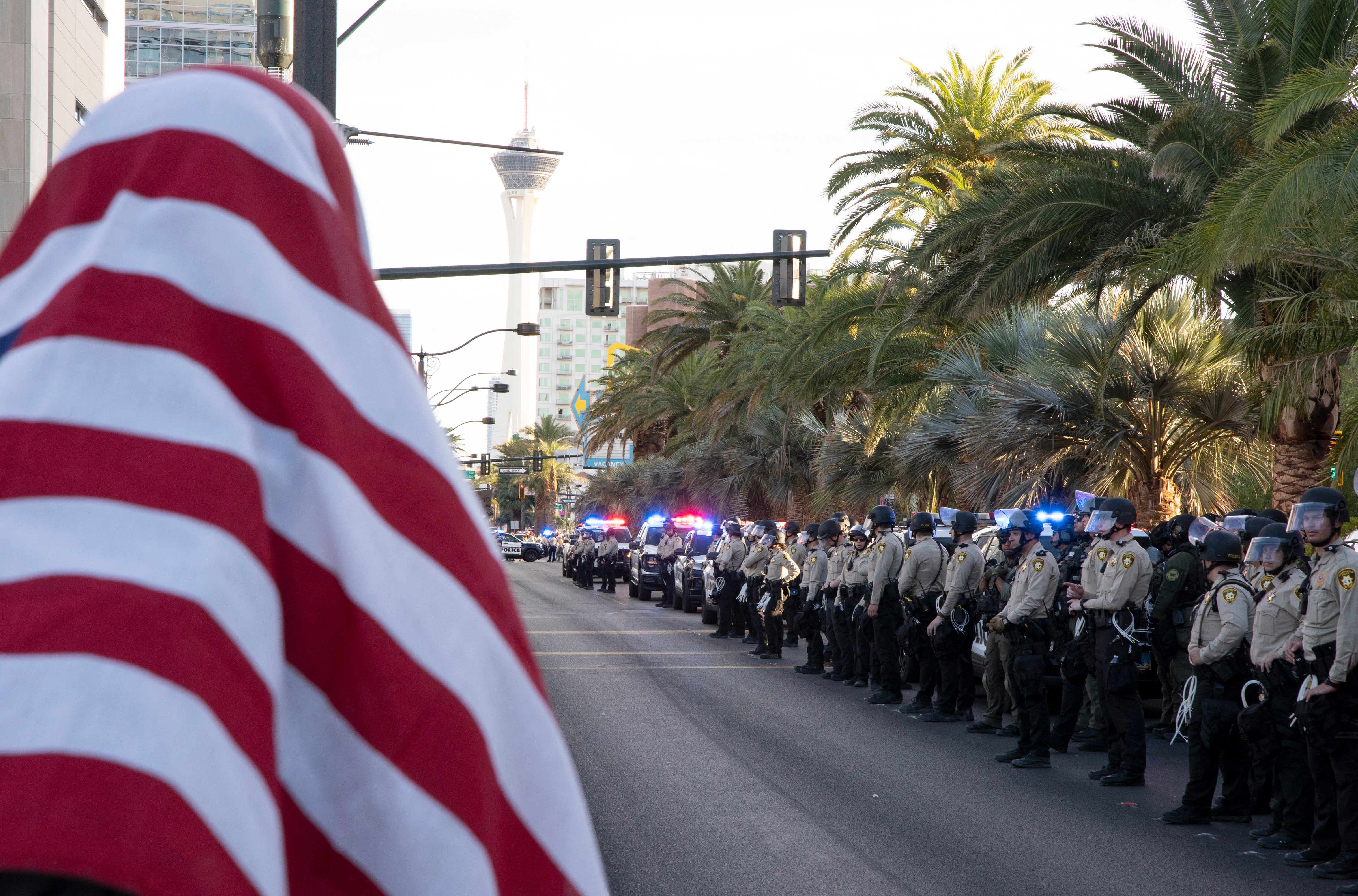 Officers line Las Vegas Boulevard during a 'No Kings' protest on June 14, 2025