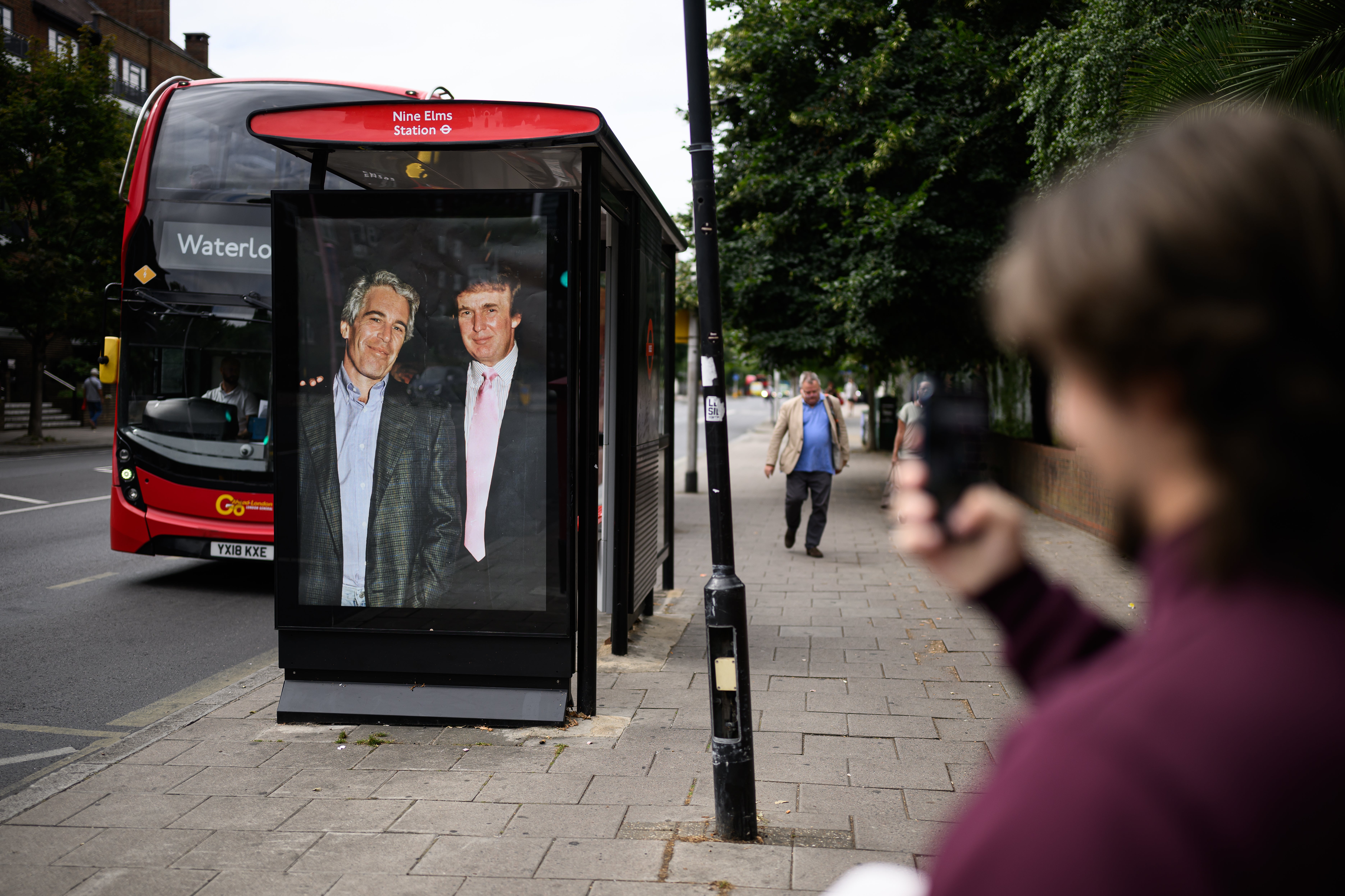 A similar prank was recently carried out in London when activists put the same old photo of Trump and Epstein on a bus shelter near the U.S. embassy ahead of the president’s state visit to the United Kingdom in September