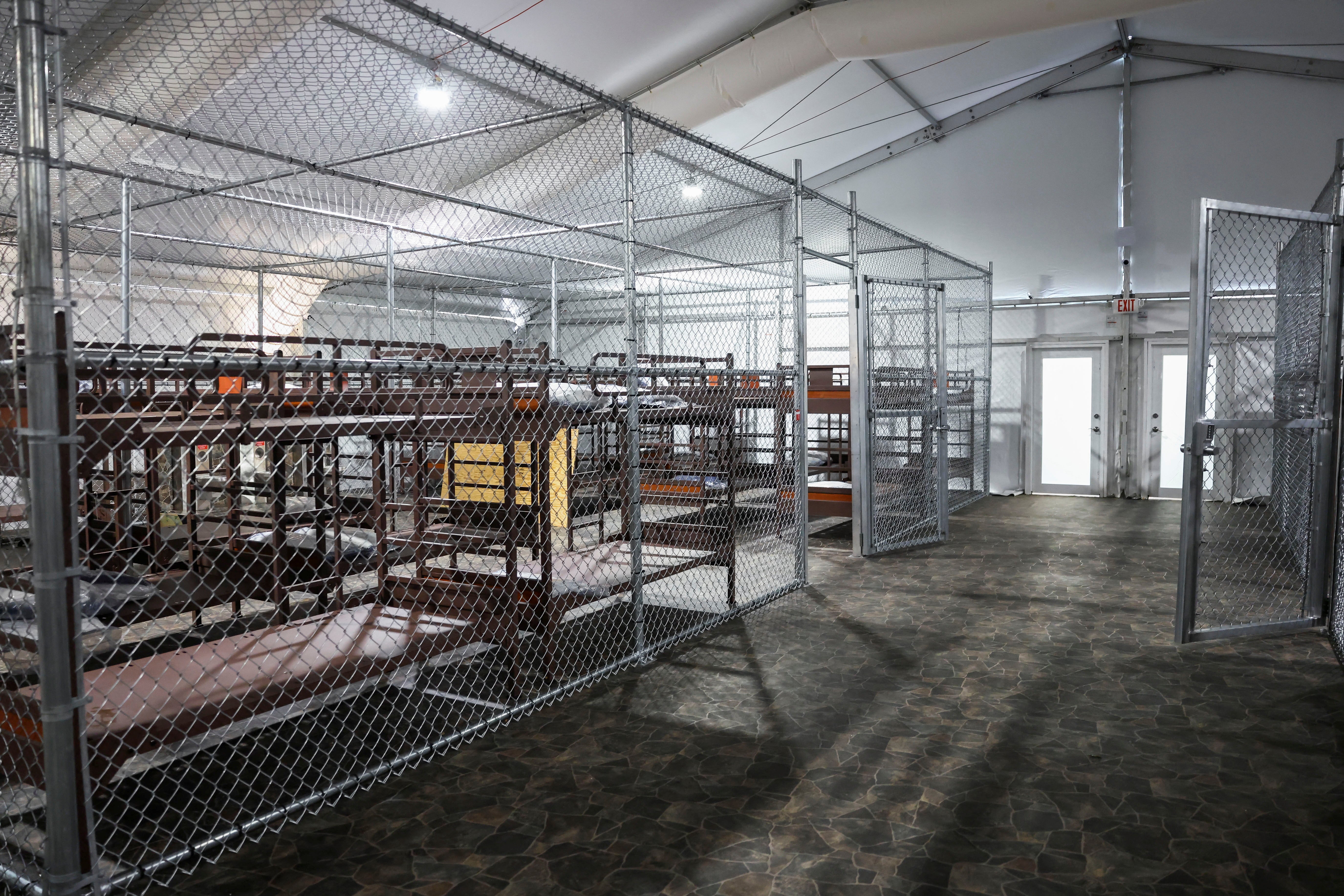 A view of one of the cages housed inside the large tents that make up the facility