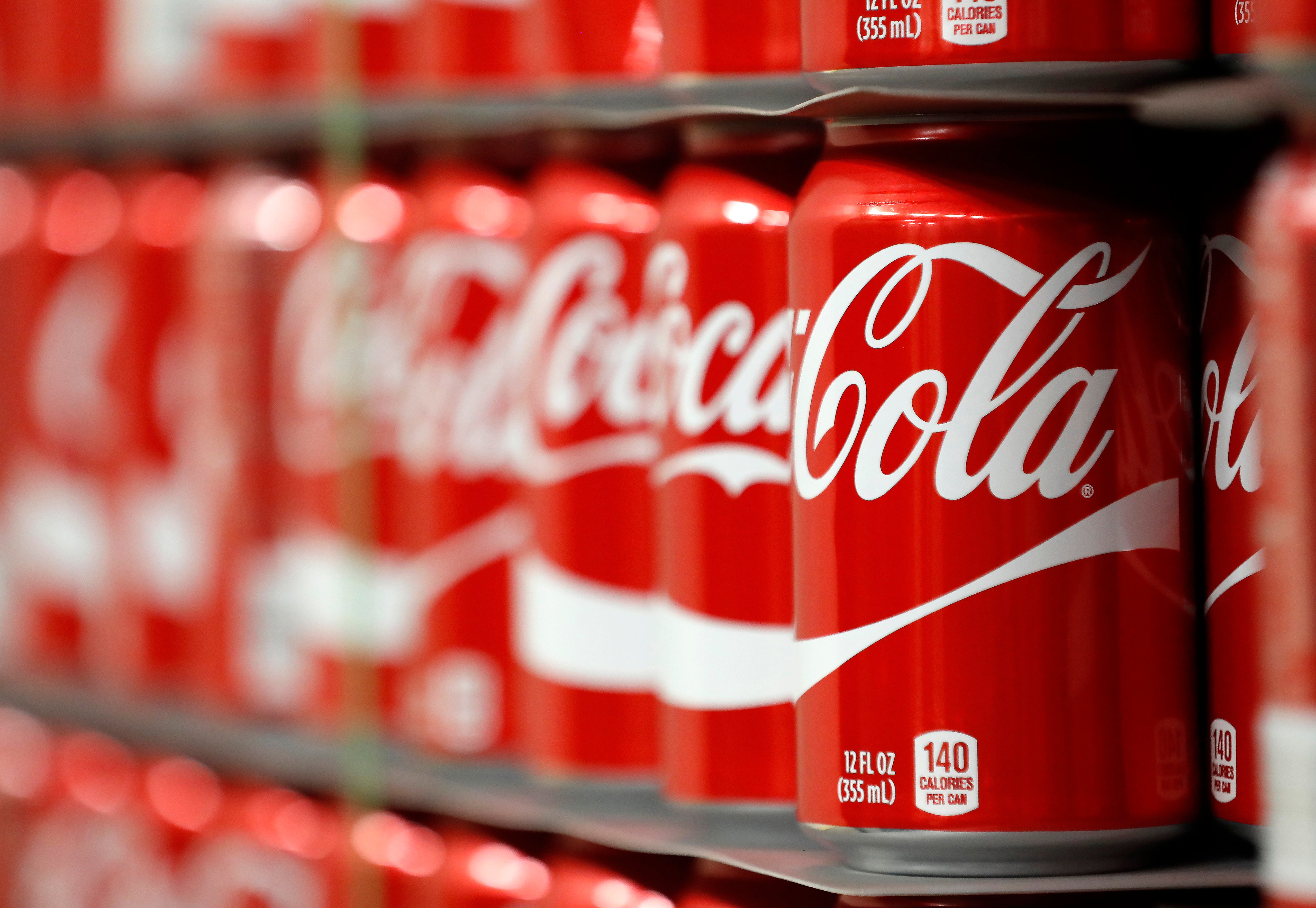President Donald Trump said Wednesday that Coca-Cola had agreed to use cane sugar in its regular Coke. The company has not confirmed the decision