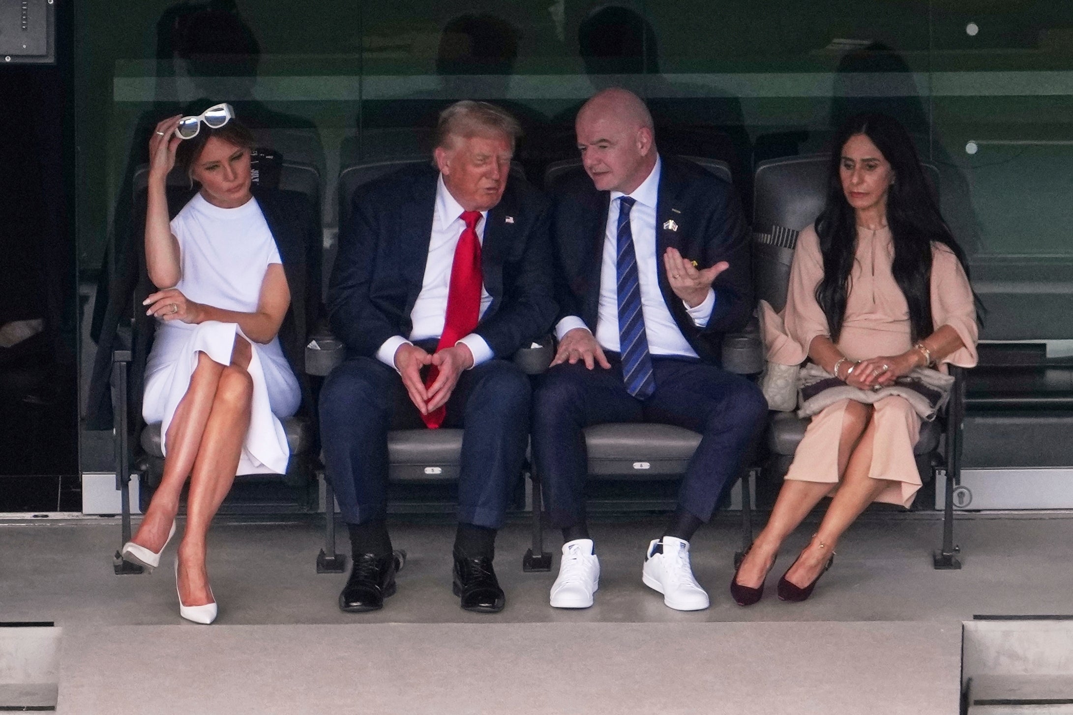 First lady Melania Trump, President Donald Trump, FIFA President Gianni Infantino and his wife Leena Al Ashqar watch the second half during the Club World Cup final soccer match between Chelsea and PSG in East Rutherford, N.J., Sunday, July 13, 2025. (AP Photo/Matt Slocum)