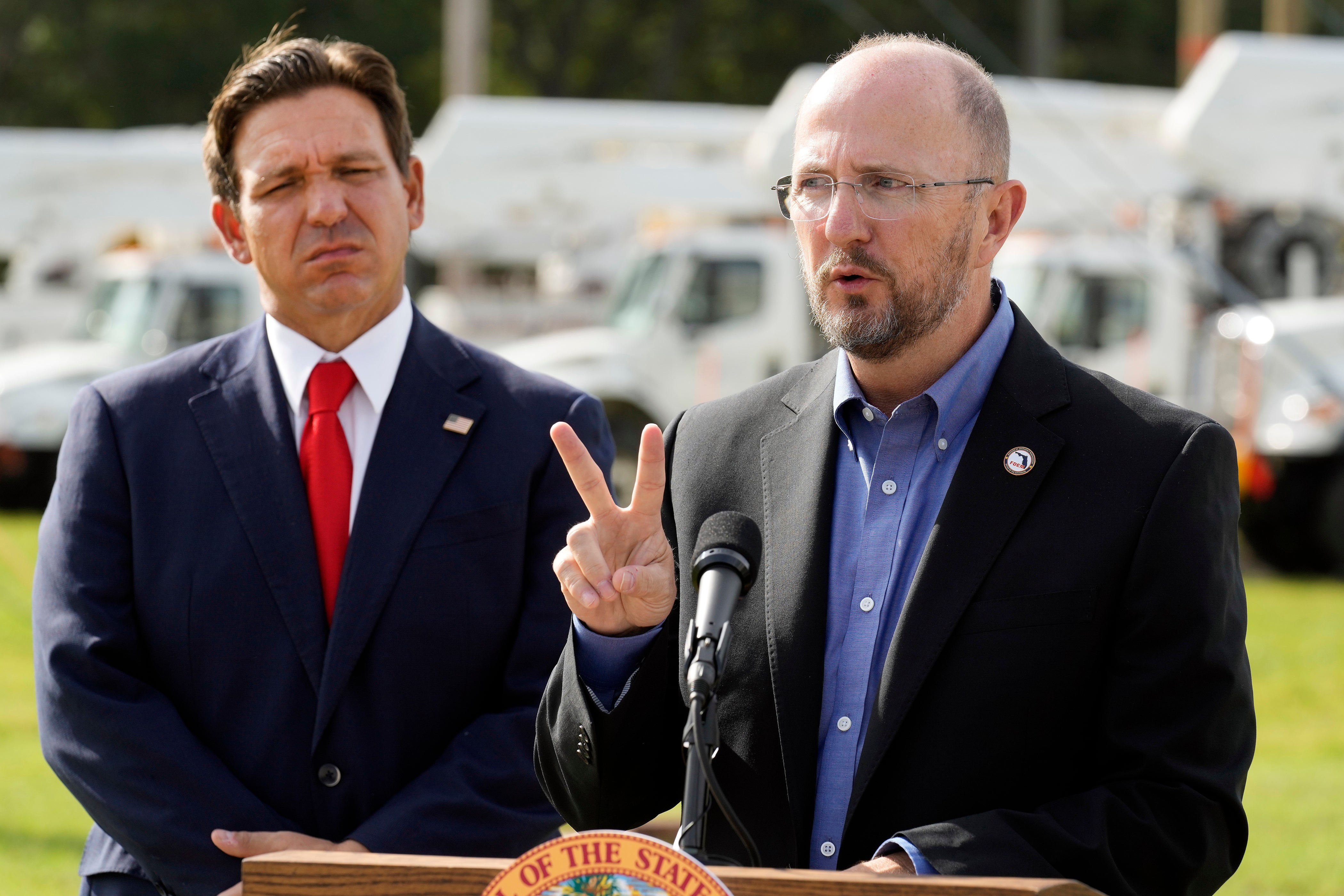 Kevin Guthrie, director of Florida Division of Emergency Management, with Florida Gov. Ron DeSantis