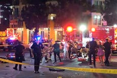 Driver whose car plowed into crowd outside Hollywood club injuring 23 shot and attacked by bystanders