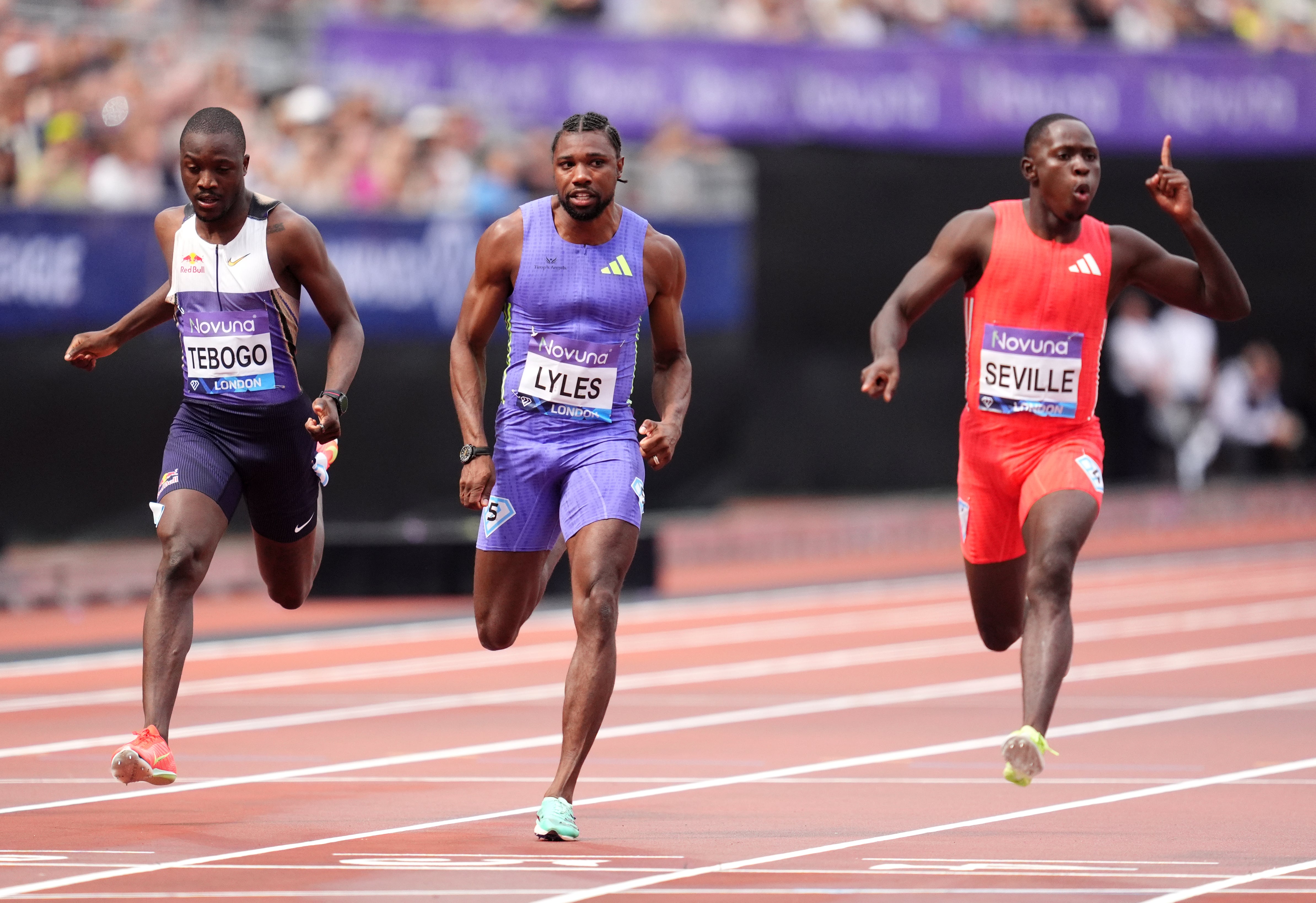 Oblique Seville (right) beat Noah Lyles (centre) in the men’s 100m (Adam Davy/PA)