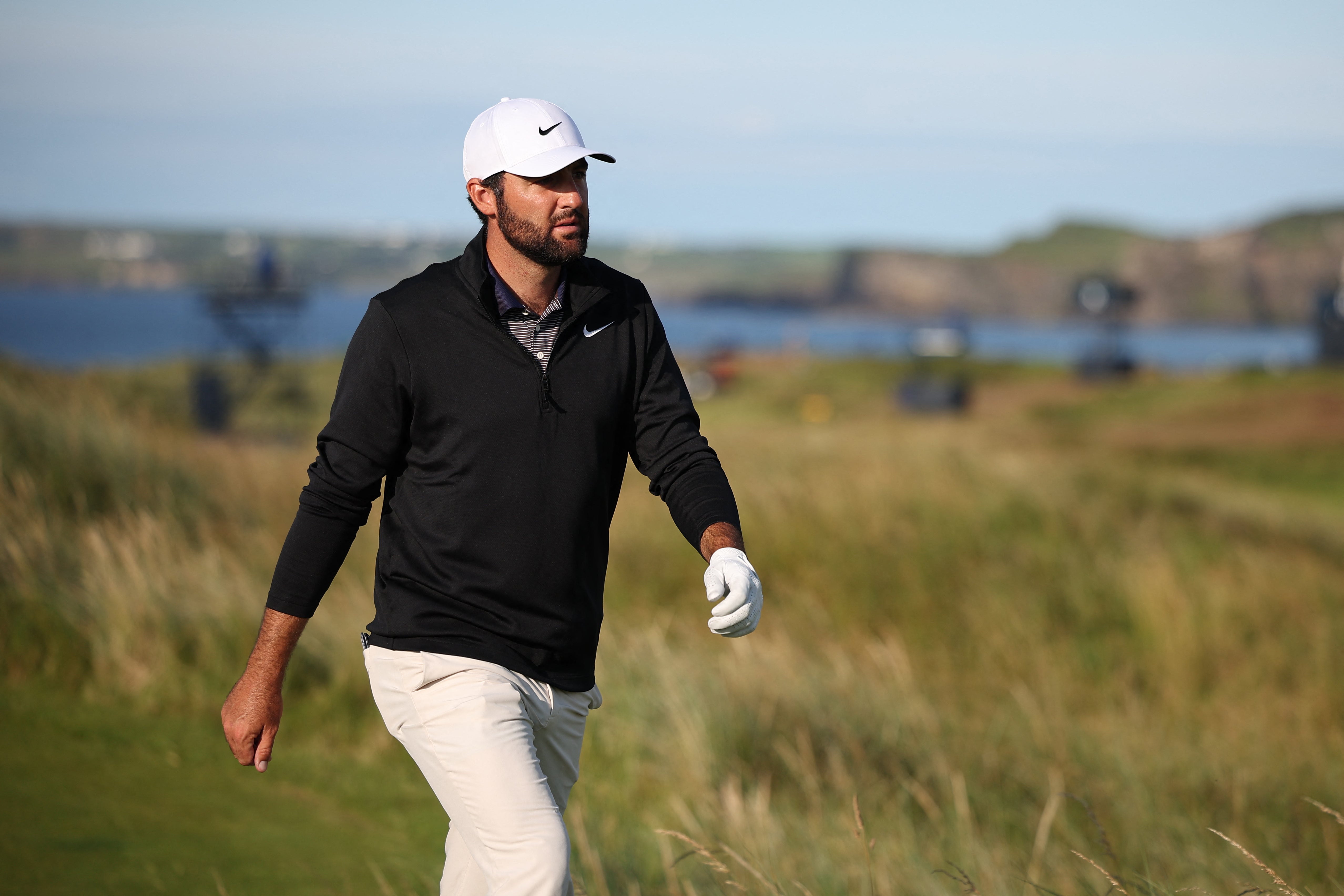 US golfer Scottie Scheffler walks up the 17th fairway on day three of the 153rd Open Championship