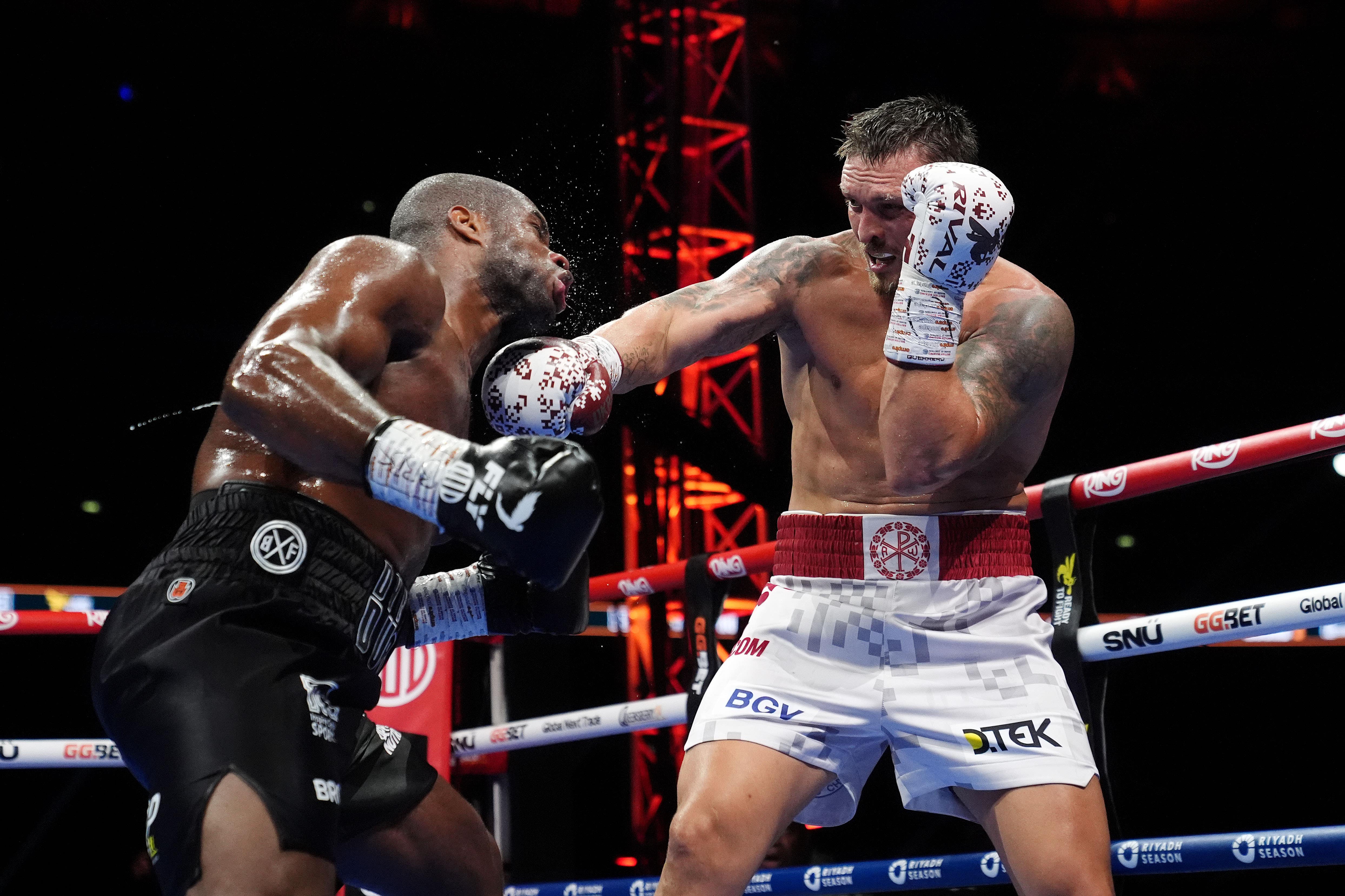 Oleksandr Usyk (right) stopped Daniel Dubois in July for the second time