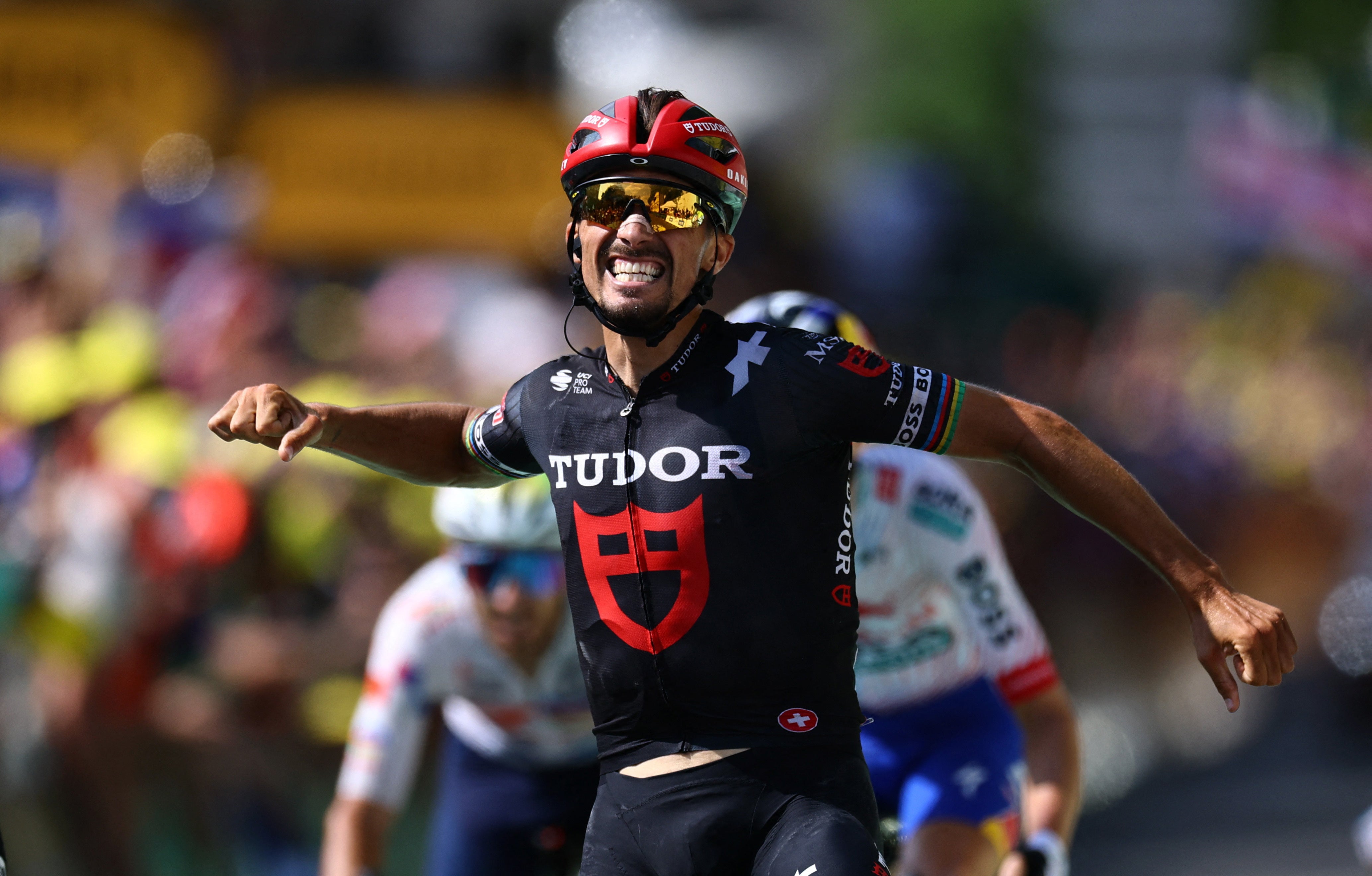 Alaphilippe - who earlier injured his shoulder in a crash - did not realise there were riders up the road