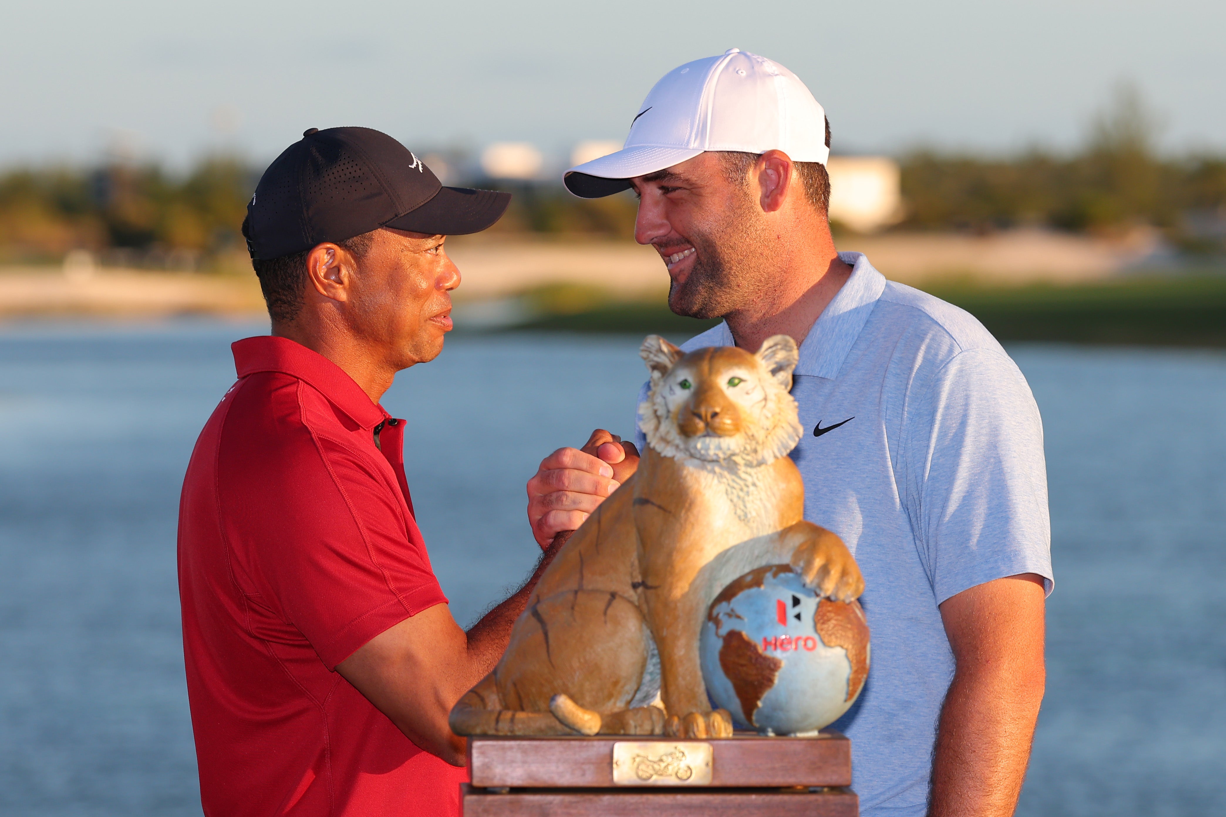 Tiger Woods congratulates Scottie Scheffler after winning the Hero World Challenge 2024