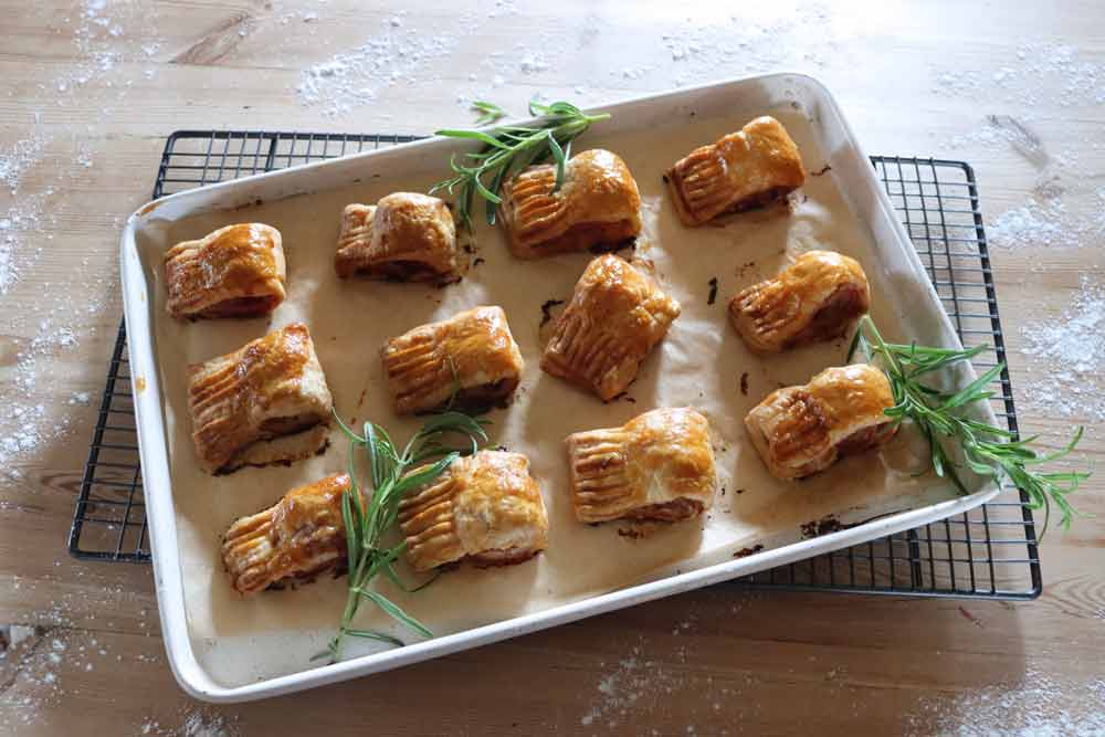 Think pigs in blankets, but better – wrapped in buttery pastry and ideal with a dollop of mustard and a cold drink in the sun