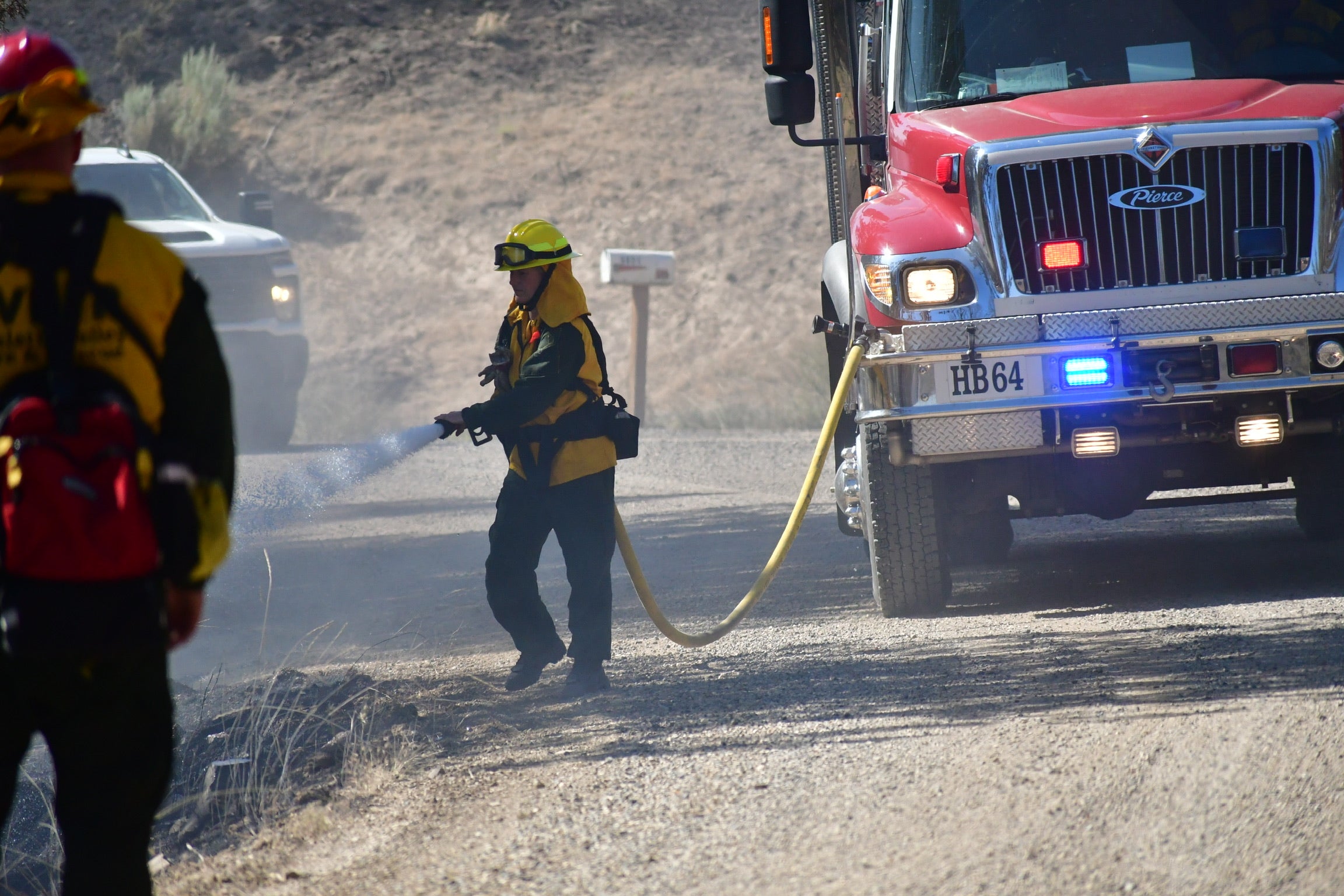 Fire crews continue to tackle the Cram Fire, tearing across nearly 100,000 acres in Oregon