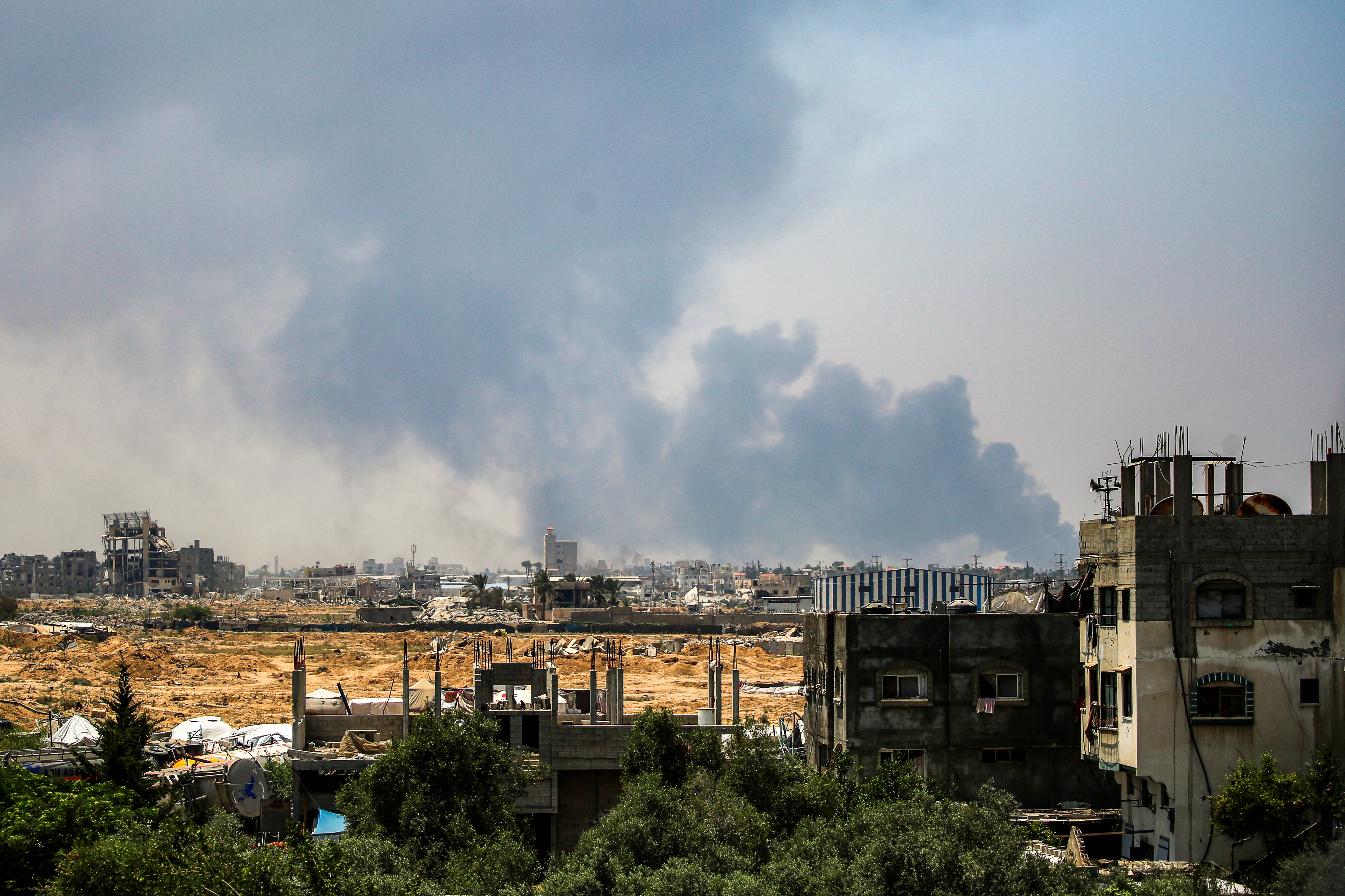 Smoke billows from Israeli bombardment as pictured from Deir el-Balah