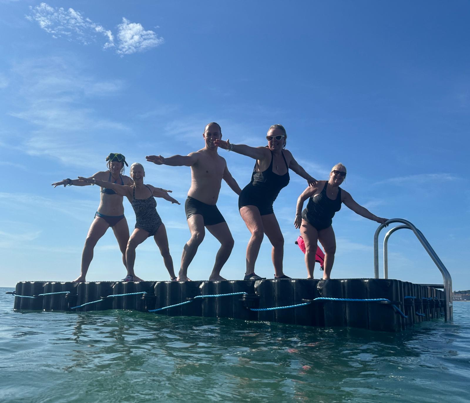Swimmers on one of the rafts before it was removed
