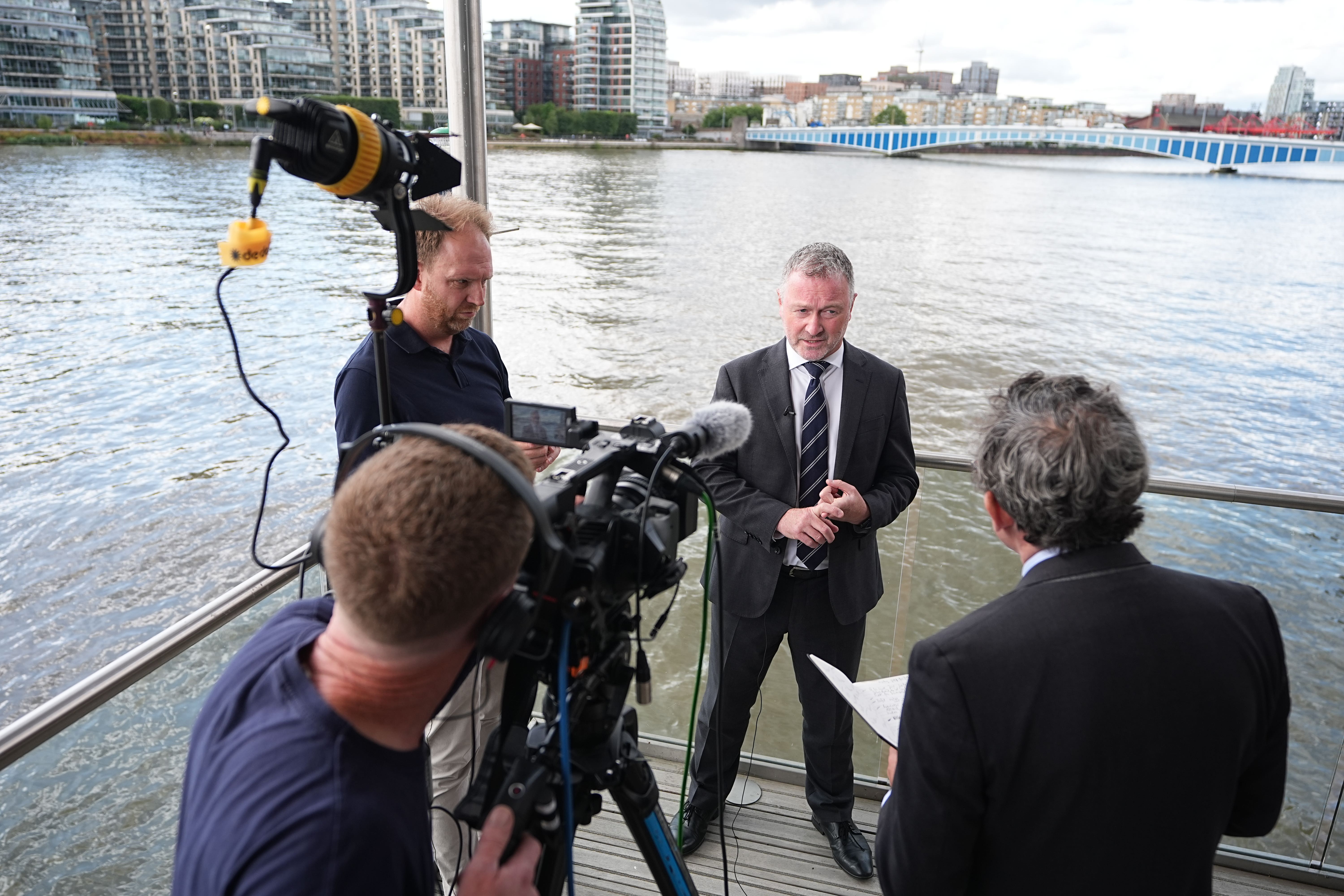 Environment Secretary Steve Reed being interviewed beside the River Thames (Aaron Chown/PA)