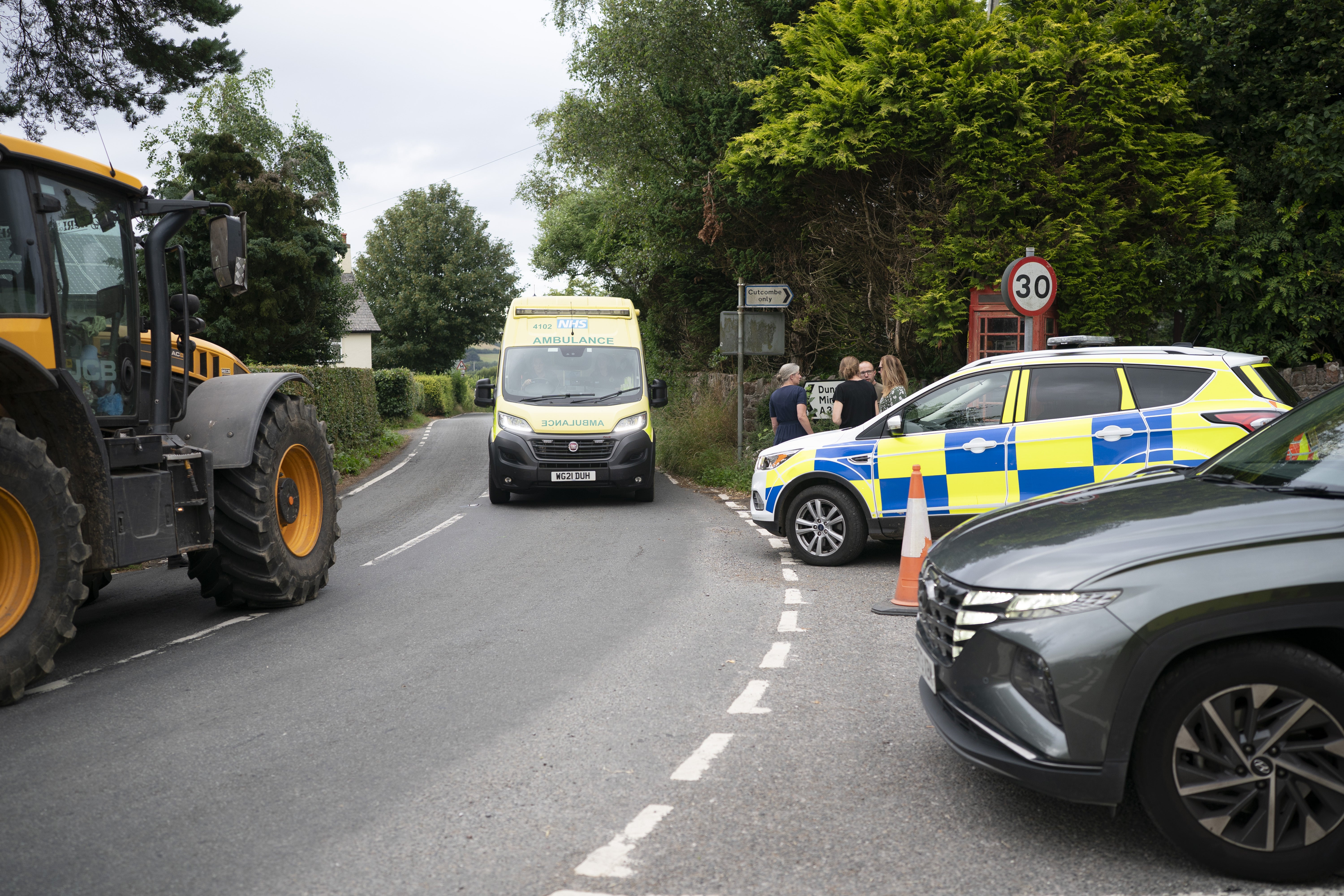 Emergency services near the scene of the bus crash on the A396 Cutcombe Hill, between Wheddon Cross and Timbercombe, near Minehead