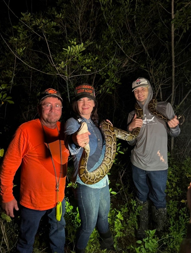 Rollins shared photos from a python hunt in the Florida Everglades that she participated in on Sunday