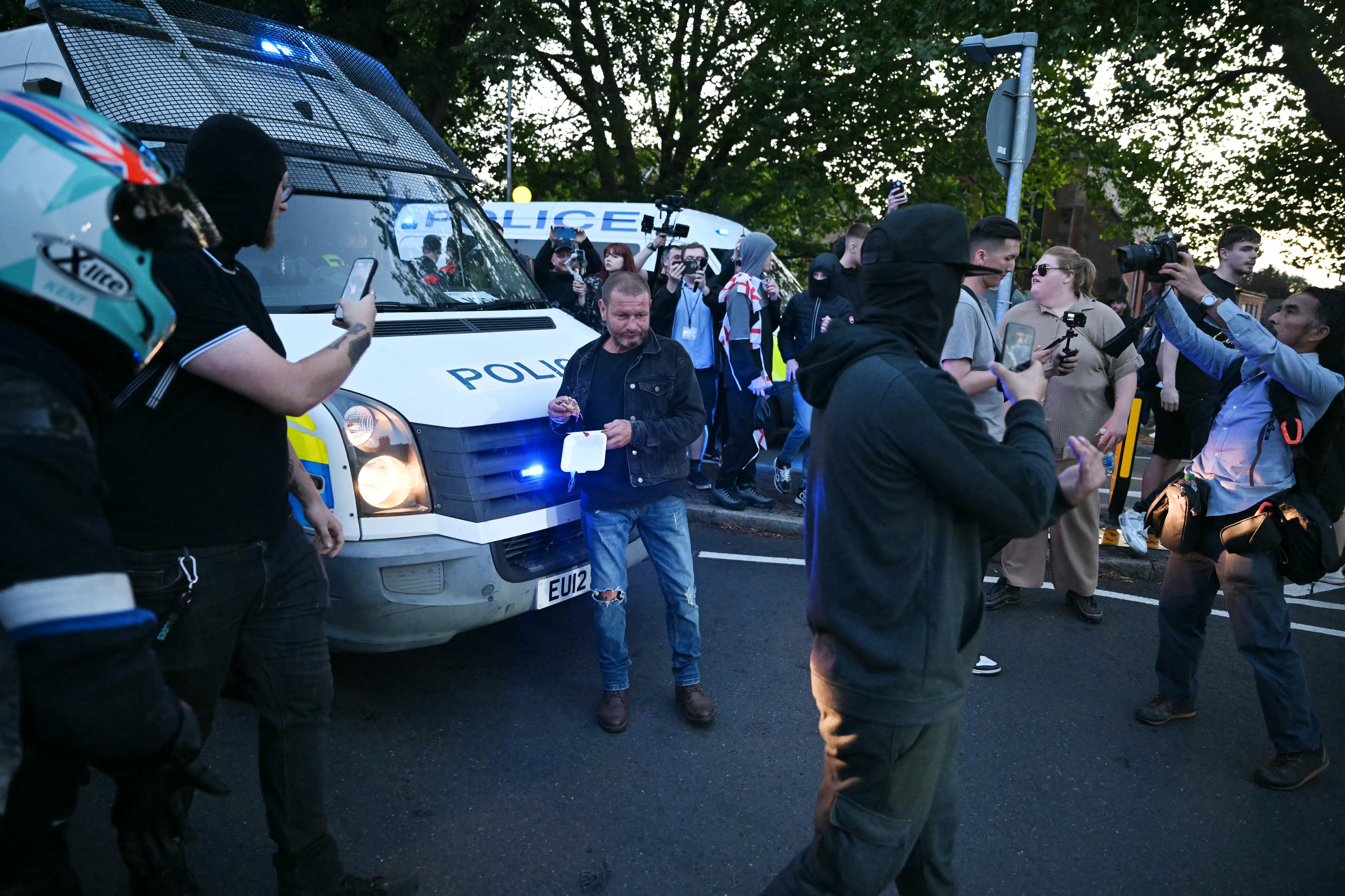 Police scuffle with protesters in Essex