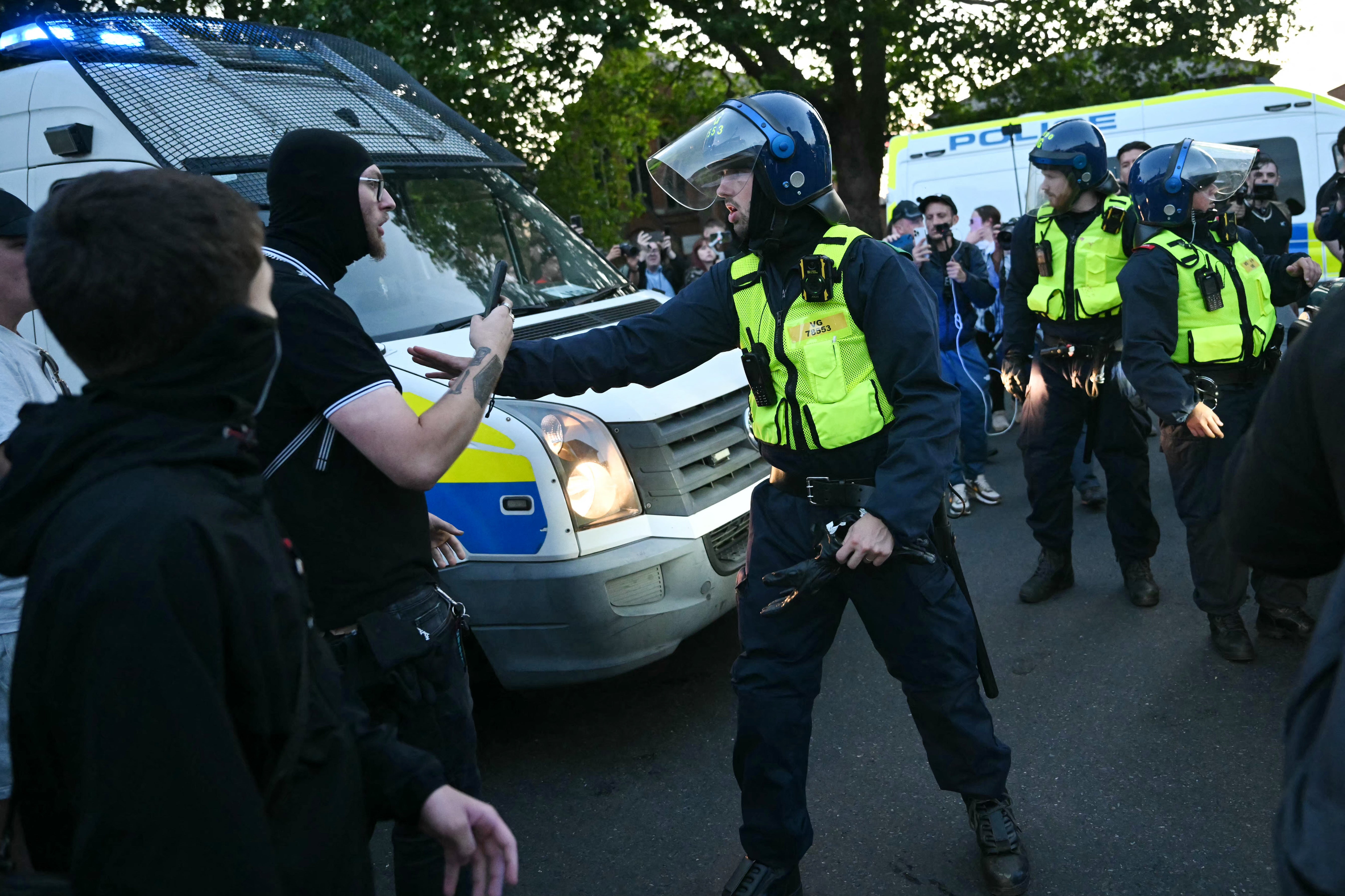 Police scuffle with protesters on Sunday